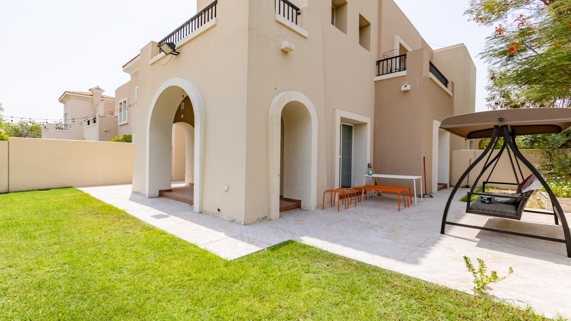 Elegant living room in 4-bedroom villa, Al Reem, Arabian Ranches, featuring modern furniture