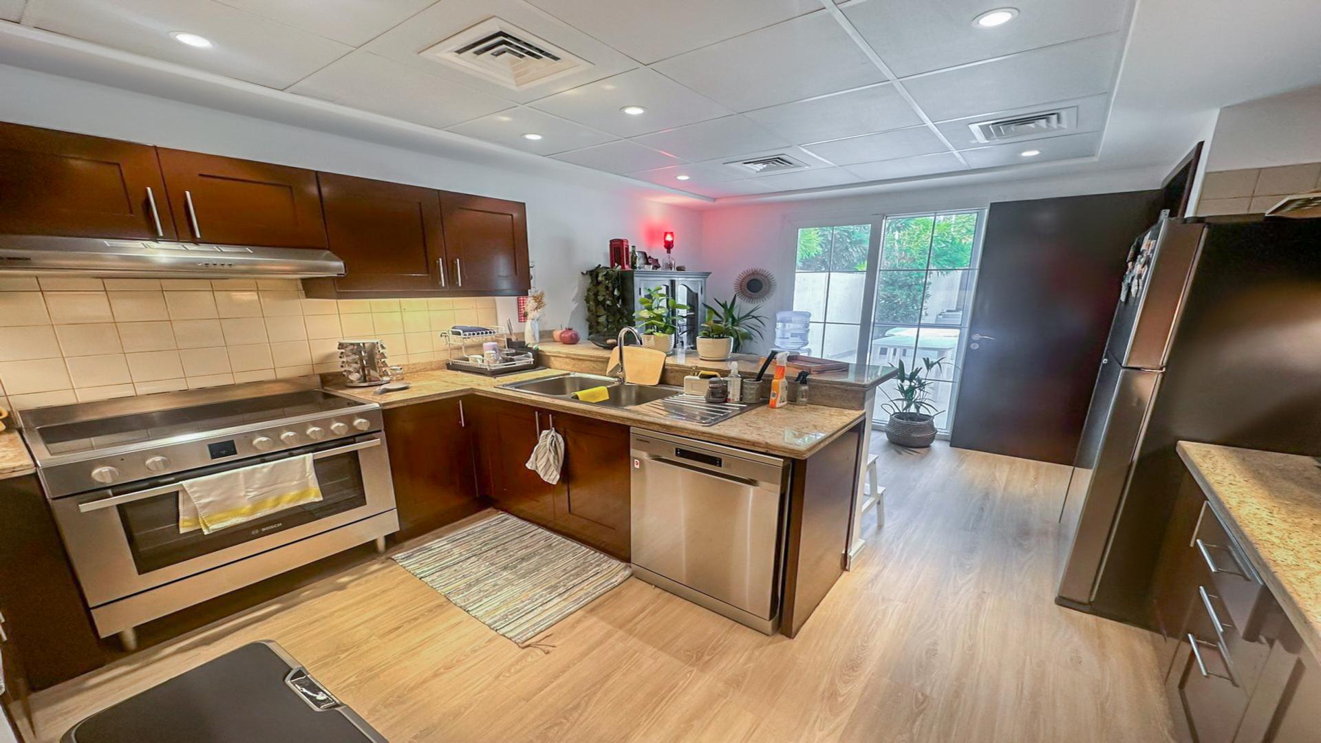 Living room with modern decor in 3-bedroom villa, Al Reem 1, Arabian Ranches