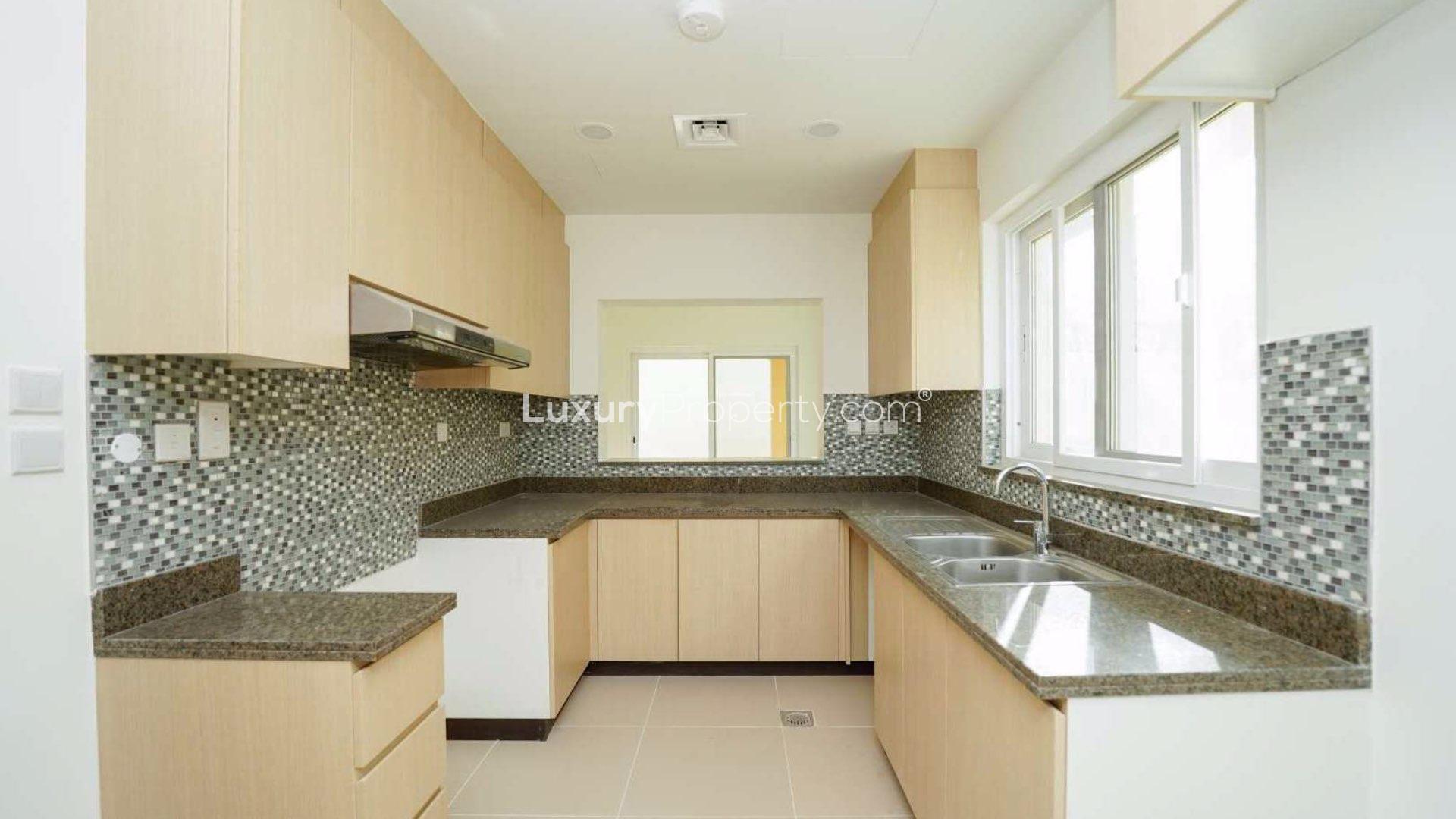 Spacious living area with staircase in Villanova standalone family villa, Dubai Land for rent