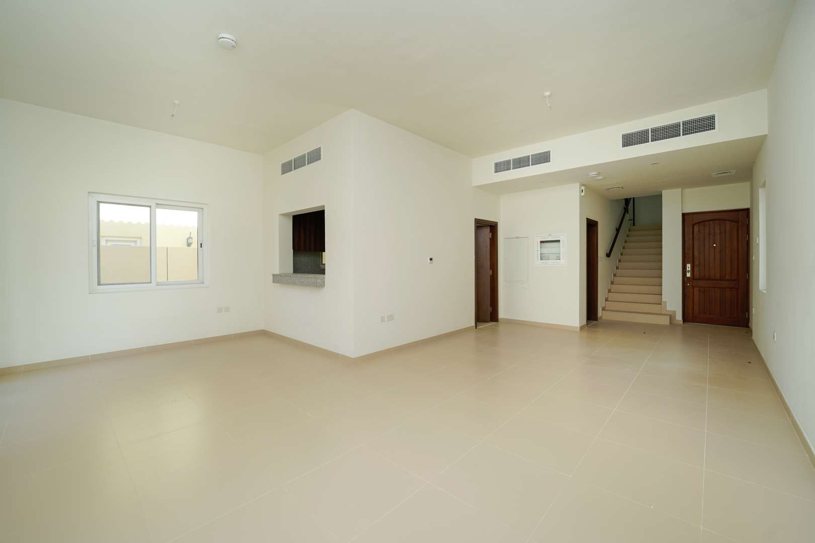 Spacious living area in three-bedroom villa for rent, La Quinta, Villanova, Dubai Land