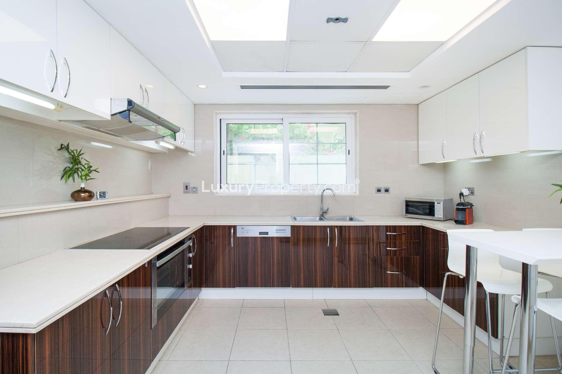 Modern kitchen in fully upgraded 3-bedroom Legacy Villa, Jumeirah Park, available for rent