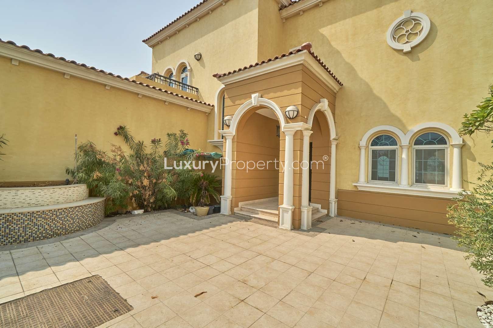 Spacious 3-bedroom villa exterior in Jumeirah Park's Legacy community with garden view