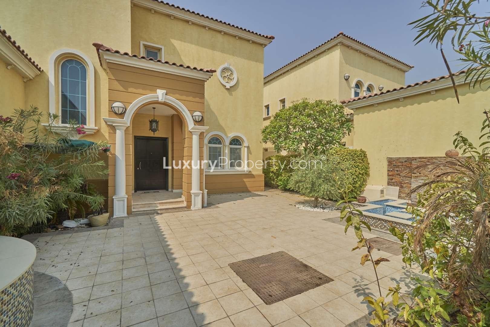 Spacious 3-bedroom villa entrance in Jumeirah Park's Legacy community with garden view