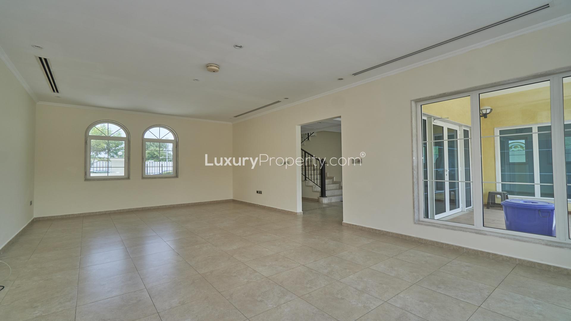 Prime 3-bedroom villa exterior in Jumeirah Park, Dubai, with spacious yard and driveway