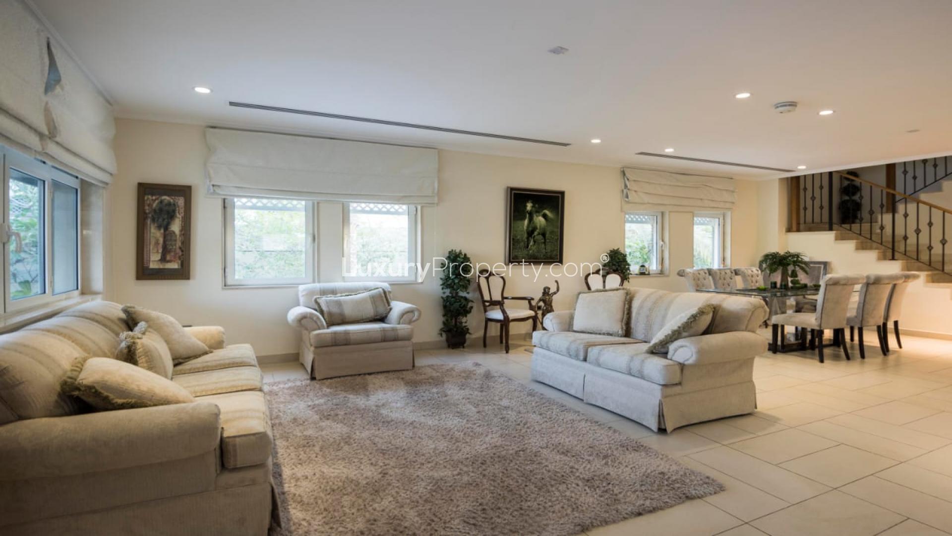 N/A,Spacious living and dining area in furnished 3-bedroom villa, Jumeirah Park, Dubai