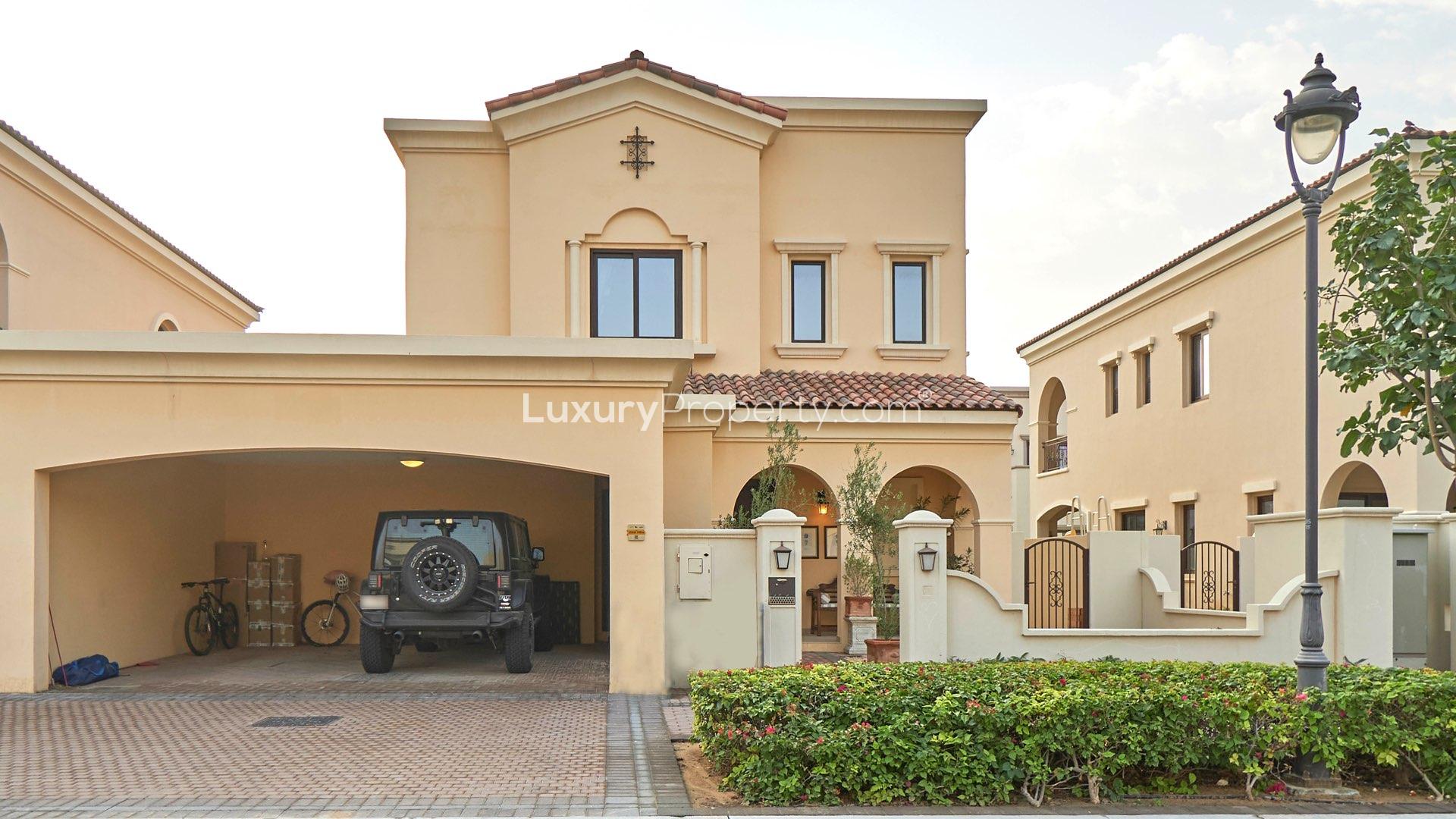 Spanish-style villa exterior with garage in Arabian Ranches 2, Lila community
