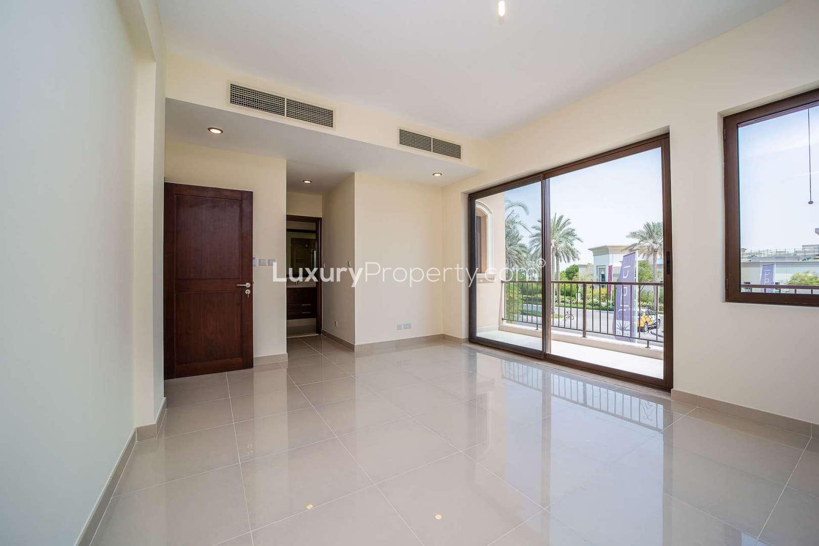 Spanish-style villa exterior with garage, Lila, Arabian Ranches 2, Dubai. For rent