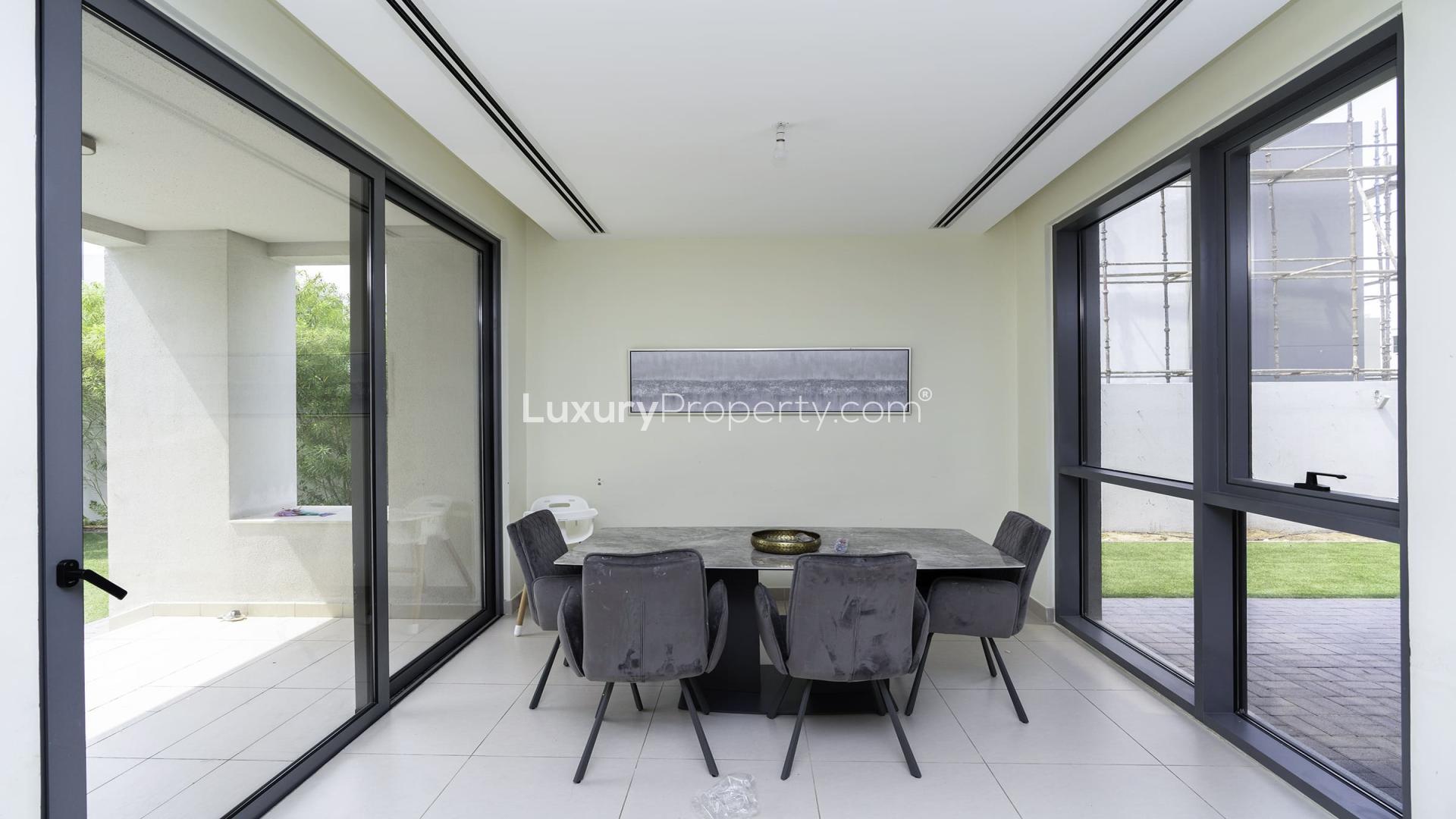 Bright living room with garden view in Sidra Villas, Dubai Hills Estate, for rent