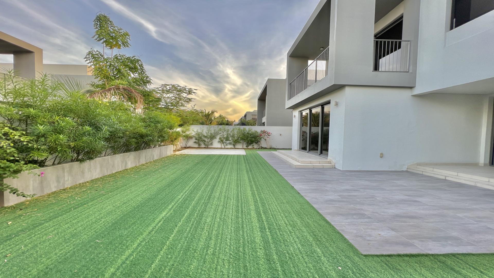 Modern 3-bedroom villa exterior with garden in Dubai Hills Estate, Sidra Villas for rent