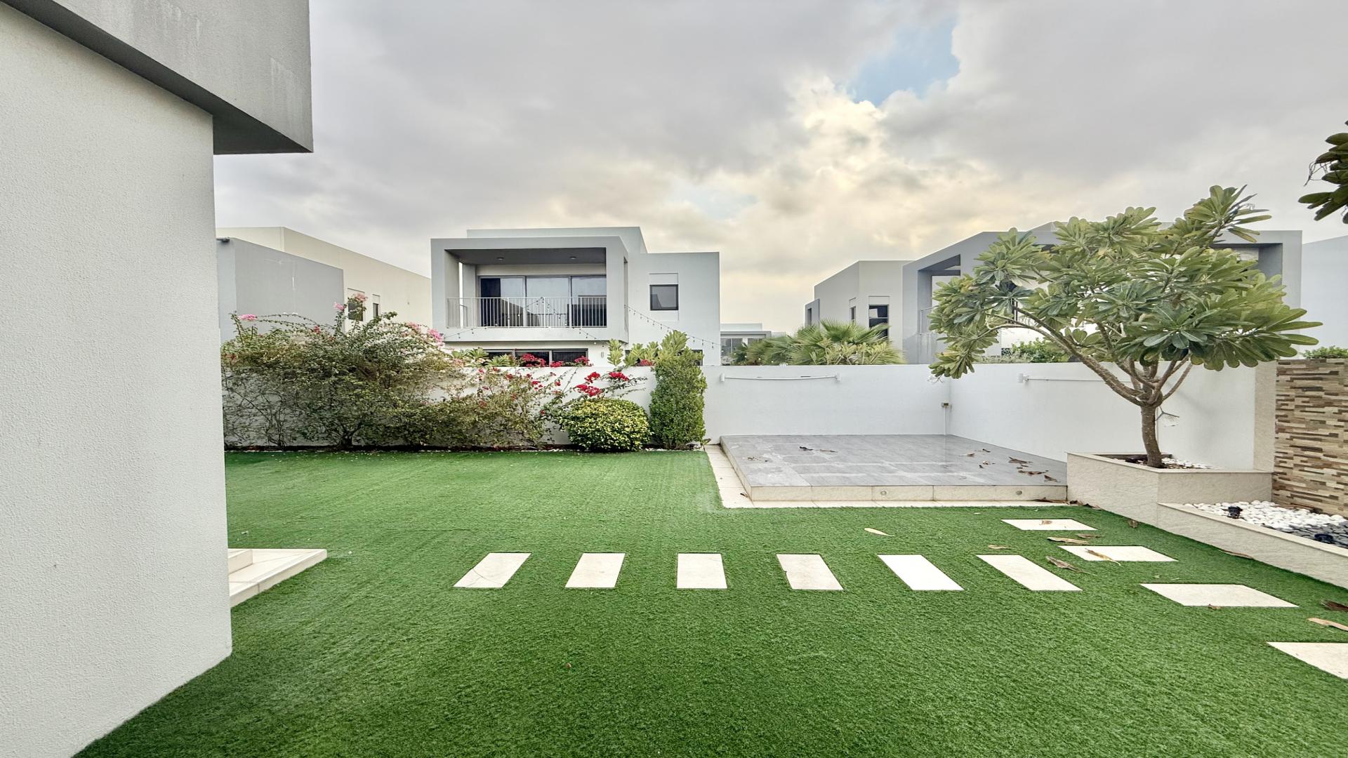Interior view of spacious kitchen and garden access in Sidra, Dubai Hills Estate villa