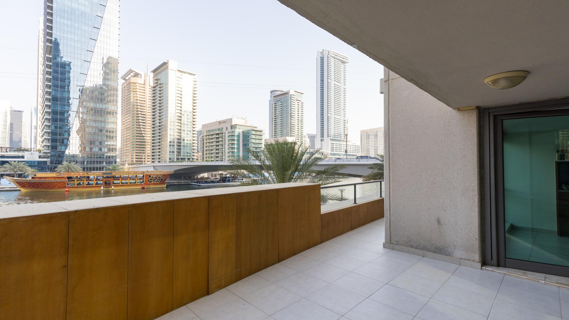 Spacious balcony view of Dubai Marina skyline from Marina Quays apartment for rent