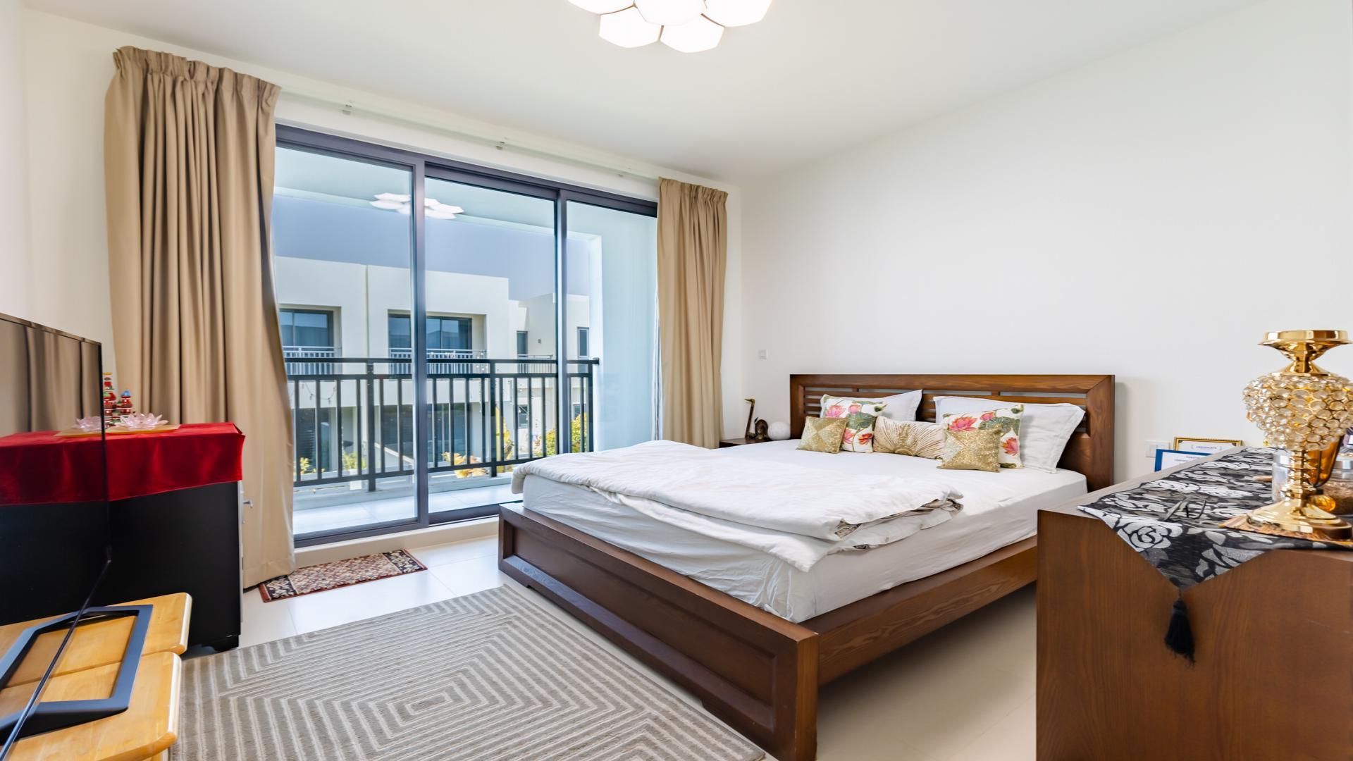 Modern kitchen in upgraded Maple 3 Villa, Dubai Hills Estate, with sleek appliances and decor