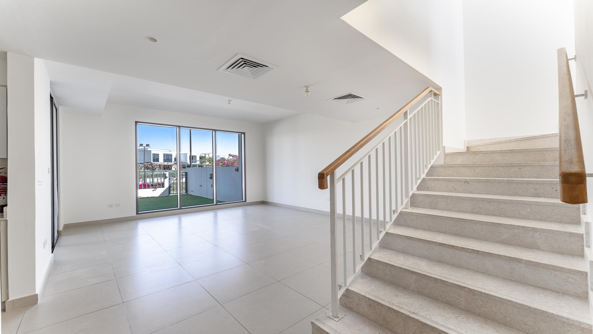 Bright living area with stairway in Dubai Hills Estate villa for rent, Maple community