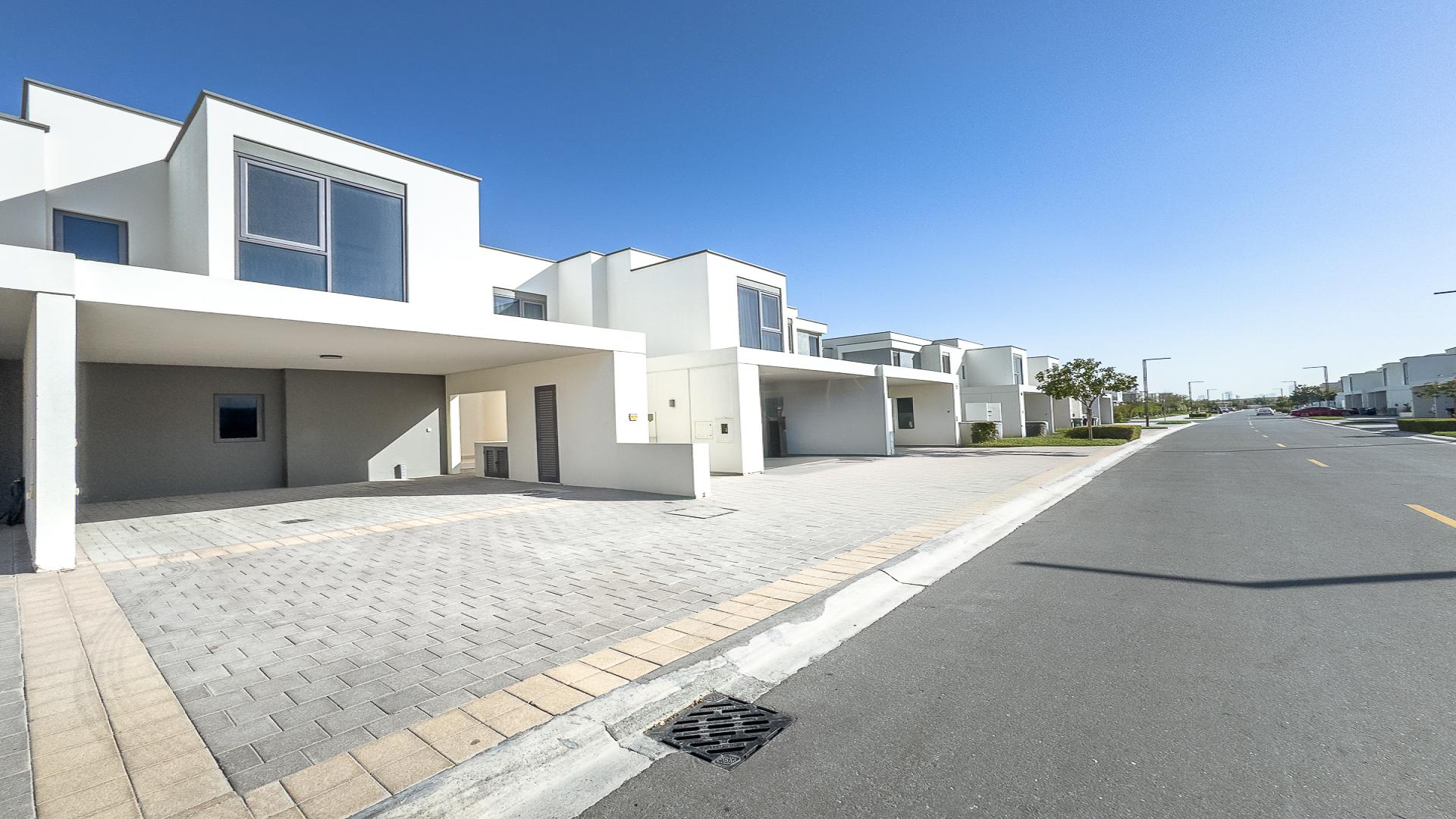 Exterior view of vacant 3-bedroom villa with garden in Dubai Hills Estate