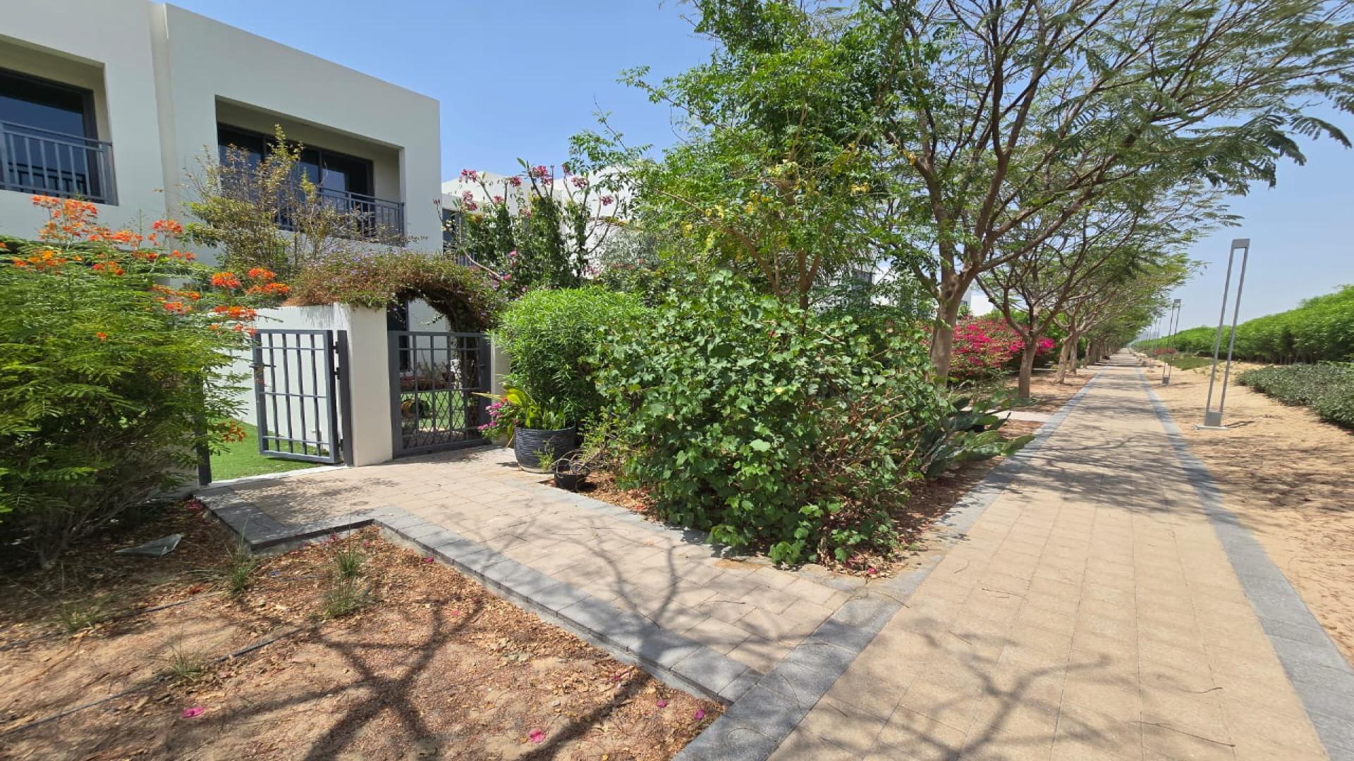 High-end 3-bedroom villa exterior in Maple 3, Dubai Hills Estate with garden view