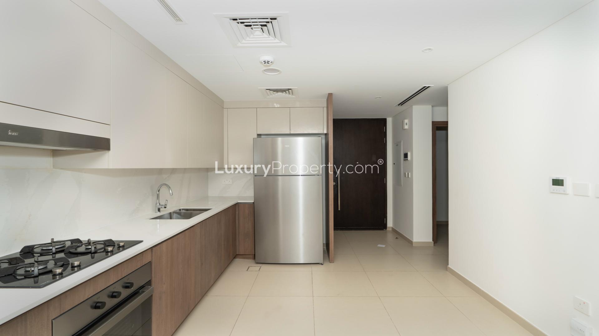Modern 3-bedroom villa exterior with garage in Elan, Tilal Al Ghaf community