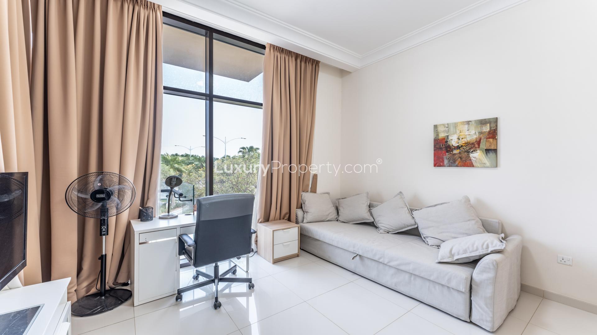 Modern kitchen with stainless steel appliances in Rockwood villa, Damac Hills for rent