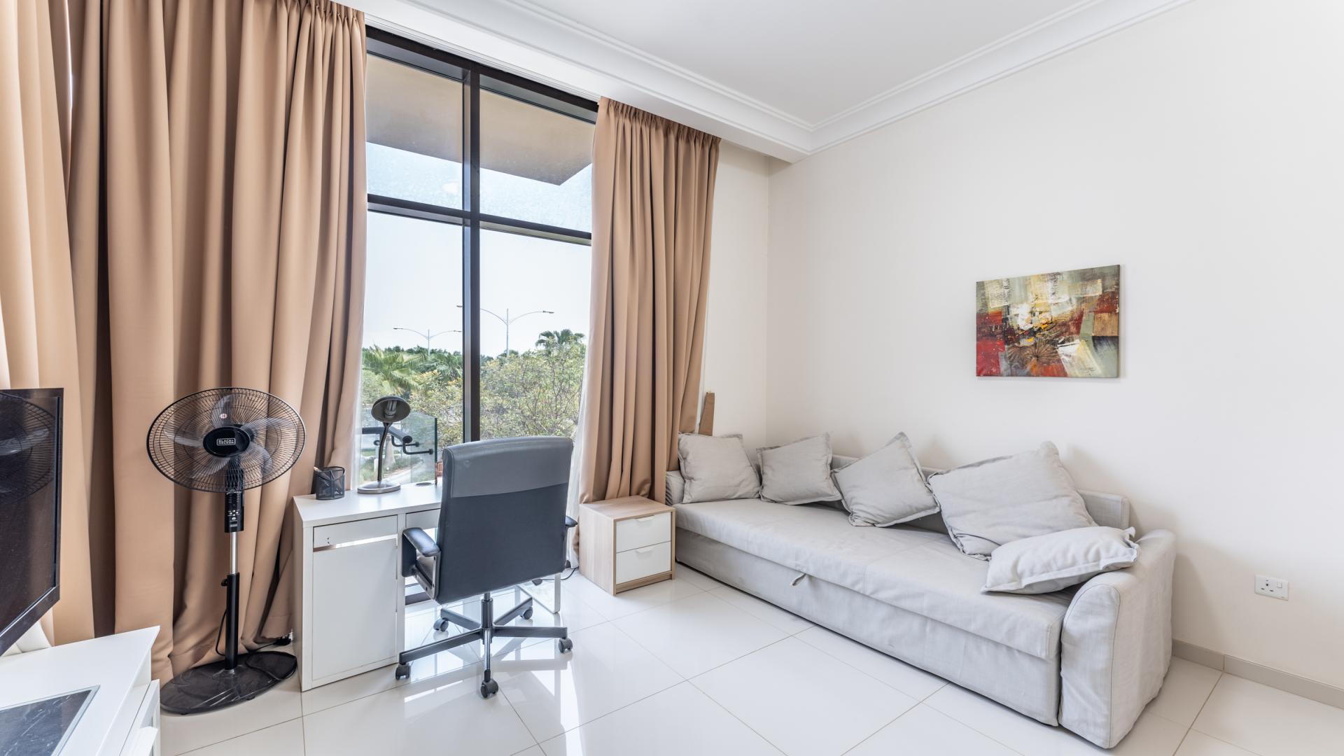 Modern kitchen with stainless steel appliances in Rockwood villa, Damac Hills for rent