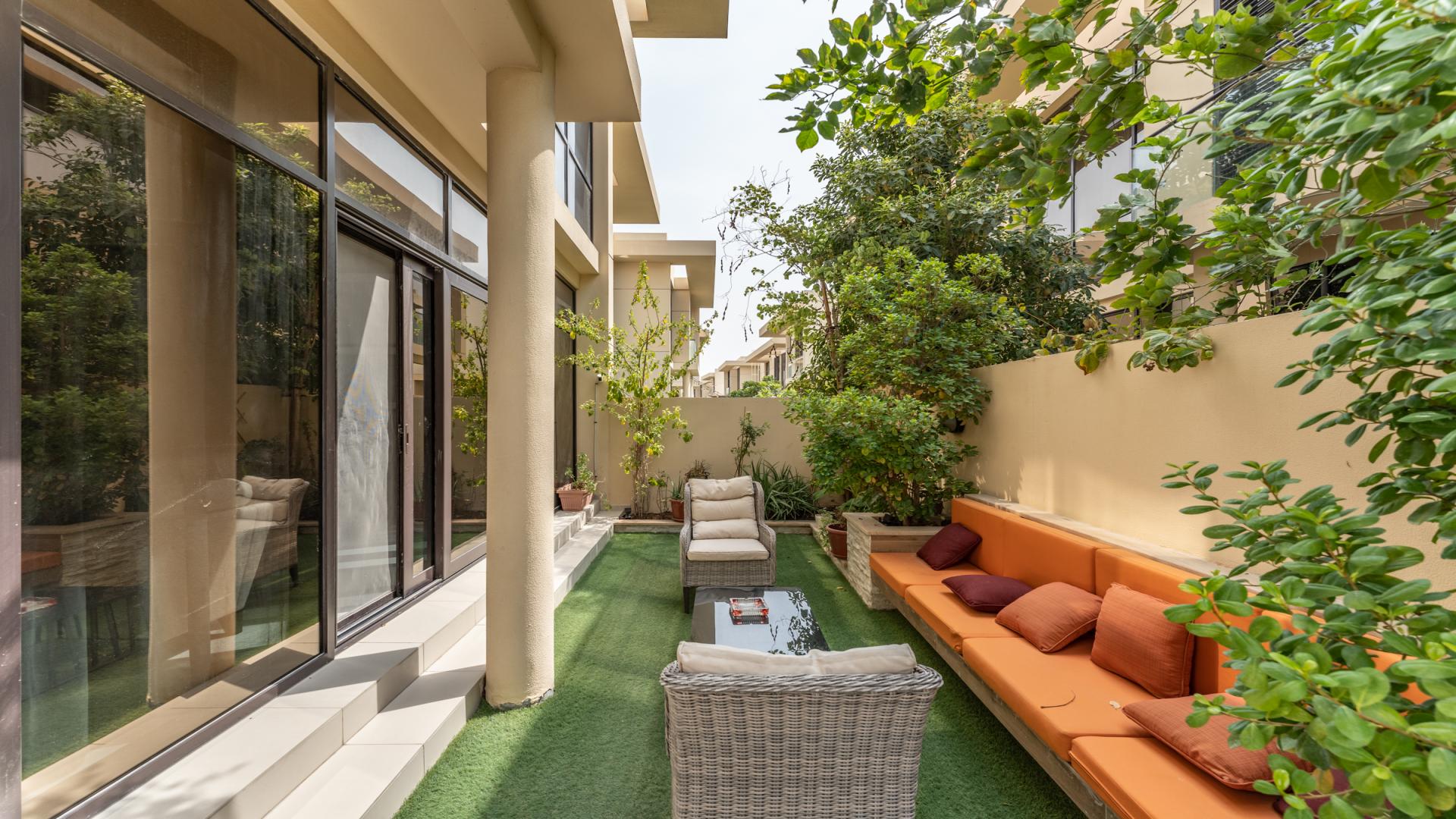 Elegant living room in furnished 3-bed villa, Damac Hills, Rockwood community, bright and stylish