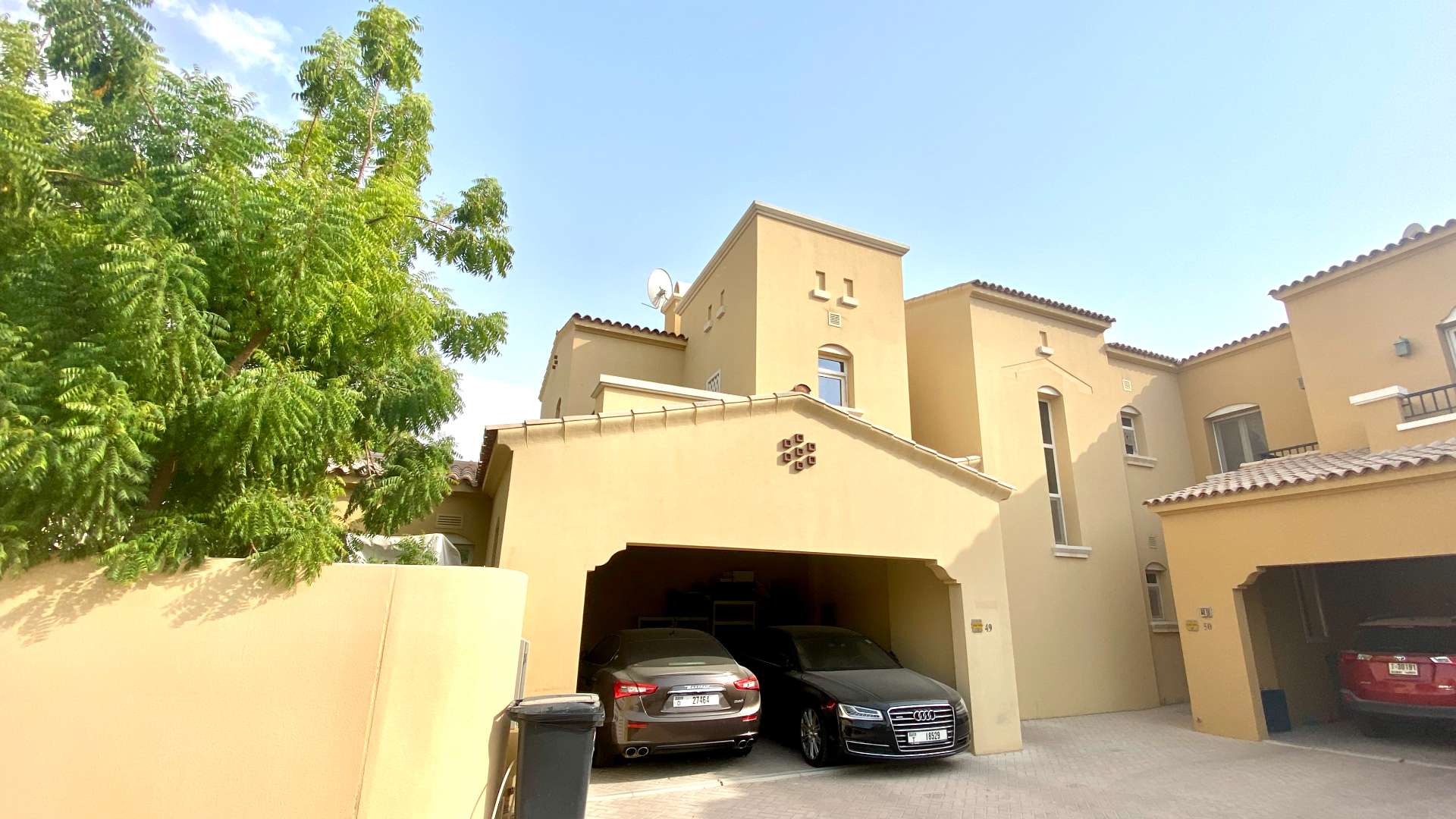Bright bedroom with dresser and crib in Palmera 2 villa, Arabian Ranches
