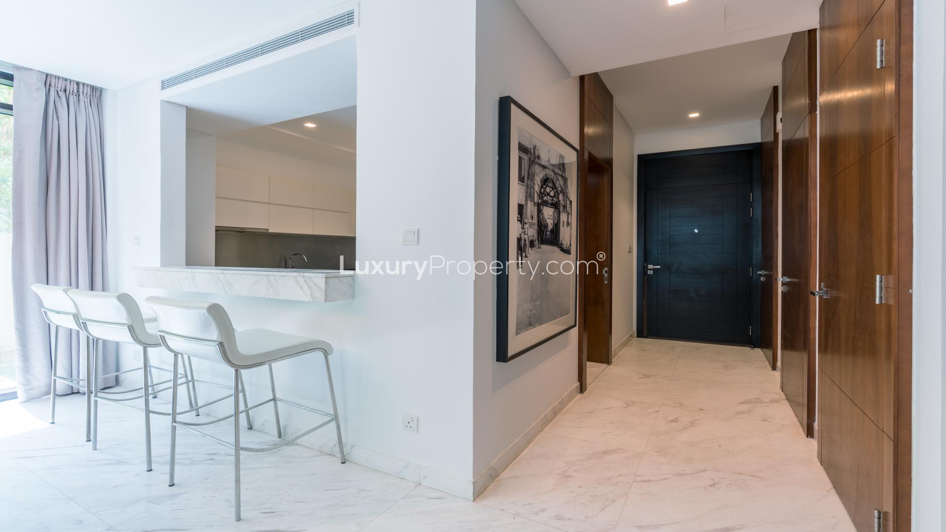 Modern 3-bedroom villa exterior with garden in Picadilly Green, Damac Hills for rent