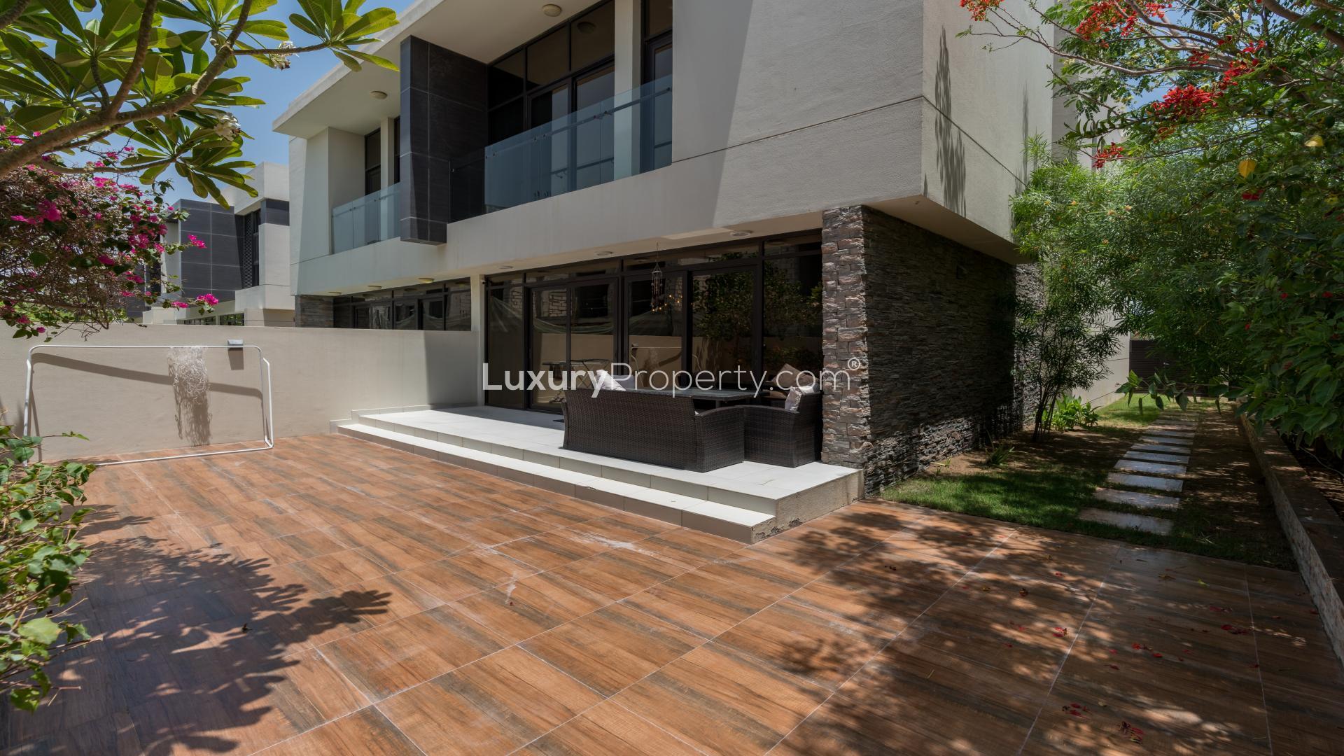 Luxurious living room in 3-bedroom villa, Damac Hills Piccadilly Green, elegant decor, spacious interior