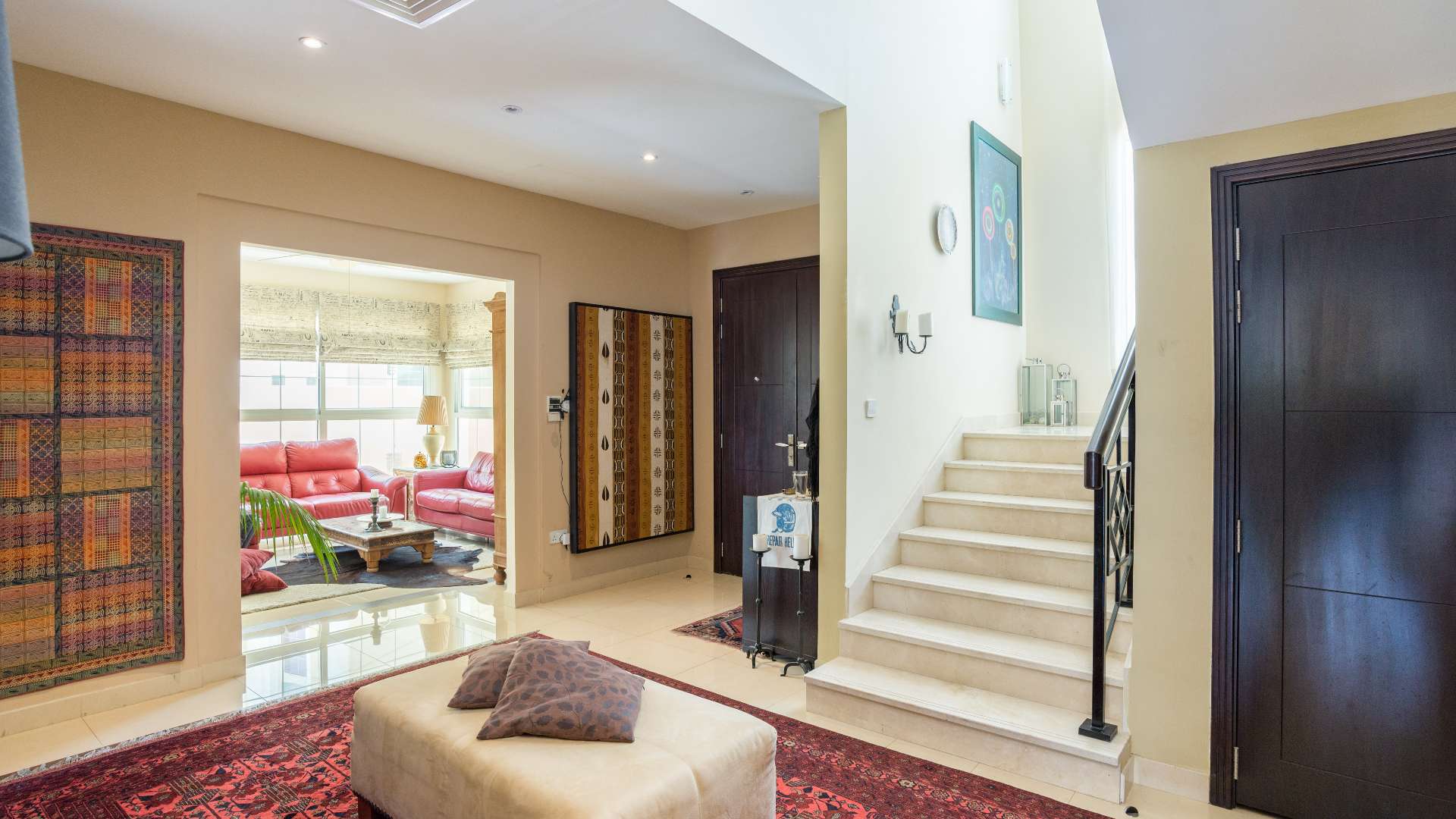 Exterior view of spacious villa in Rahat, Mudon with landscaped garden and patio area