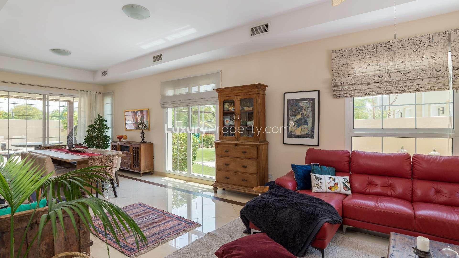 Interior view of Rahat villa in Mudon, featuring modern staircase and cozy living area