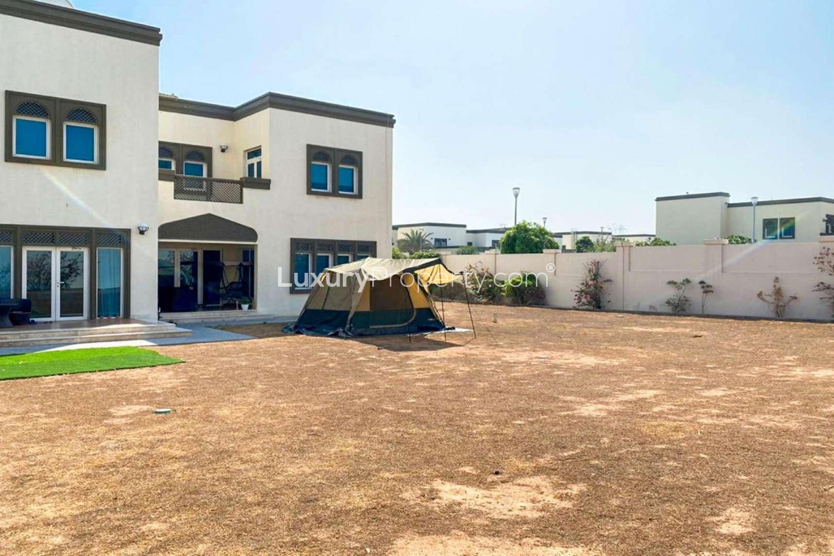 Exterior view of spacious 3-bedroom villa for rent in Jumeirah Park, Regional community