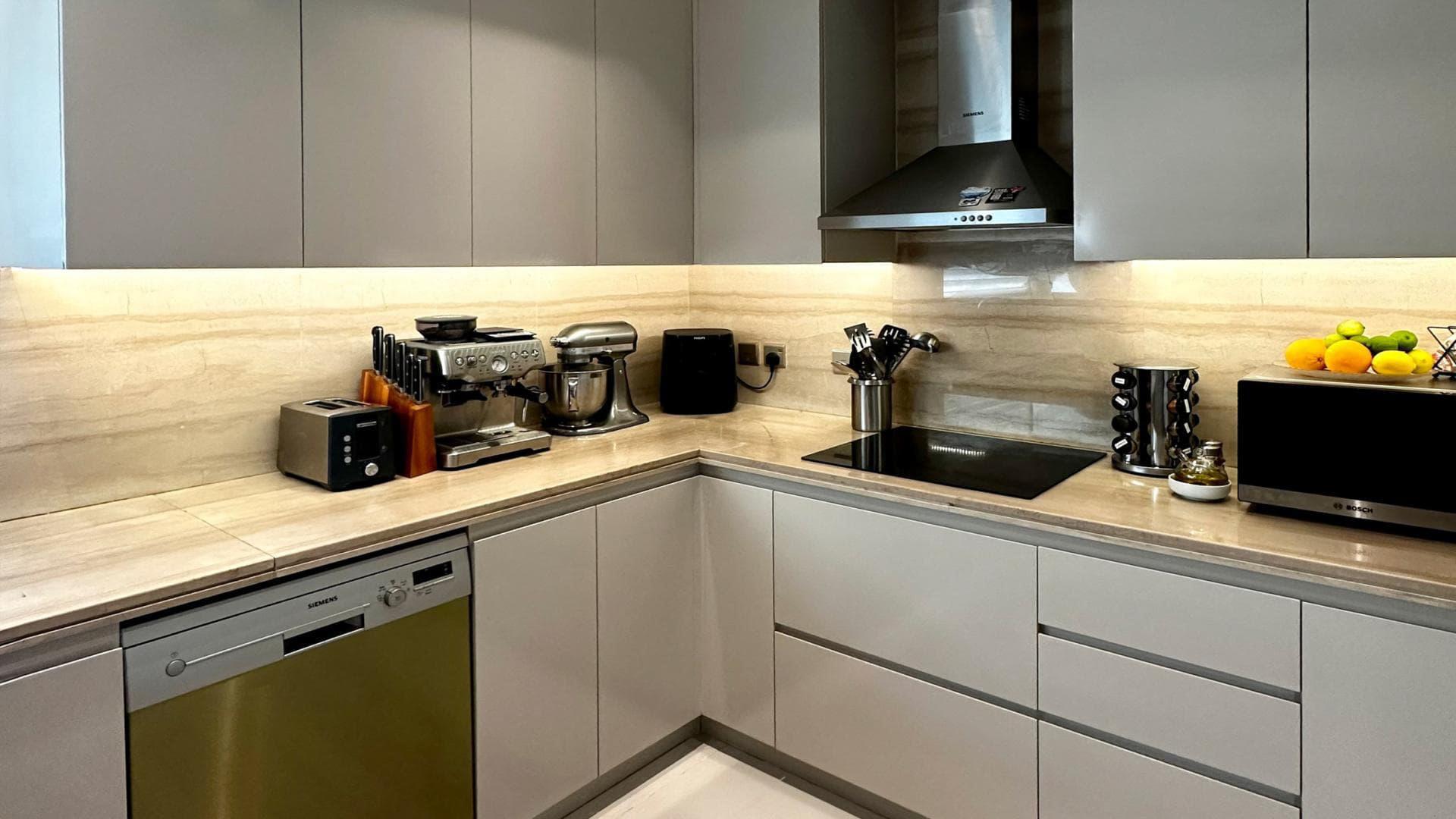 Balcony view from Trevi villa in Damac Hills, featuring modern design and greenery