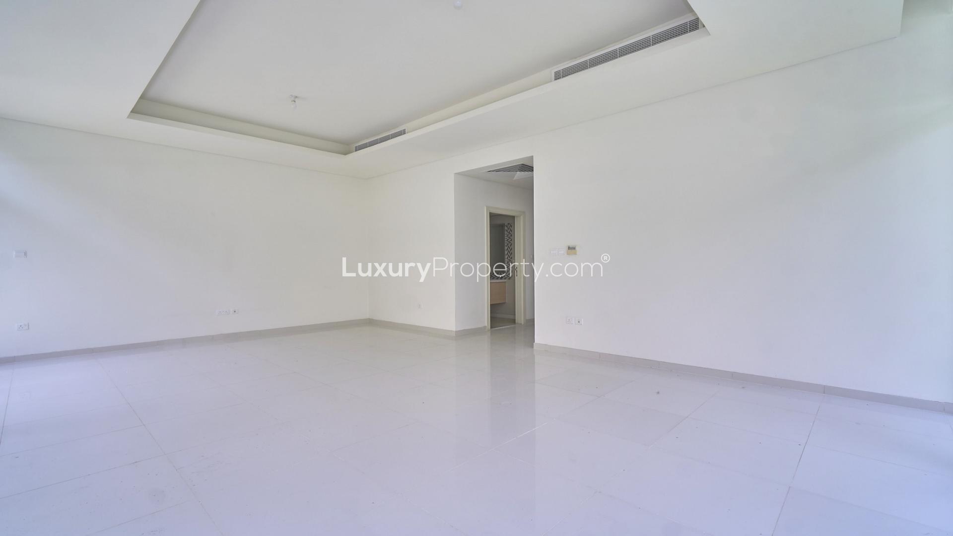 Spacious 3-bedroom villa in Damac Hills Richmond community with modern design and greenery