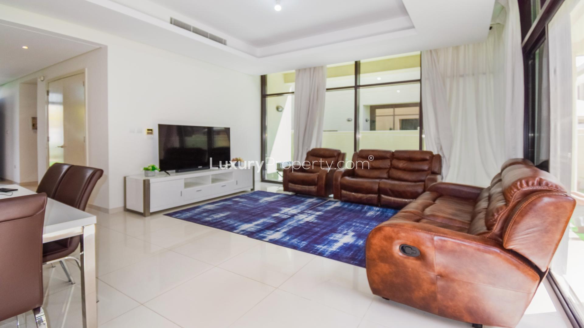 Beautiful villa with landscaped garden in Damac Hills, Rochester community, exterior view