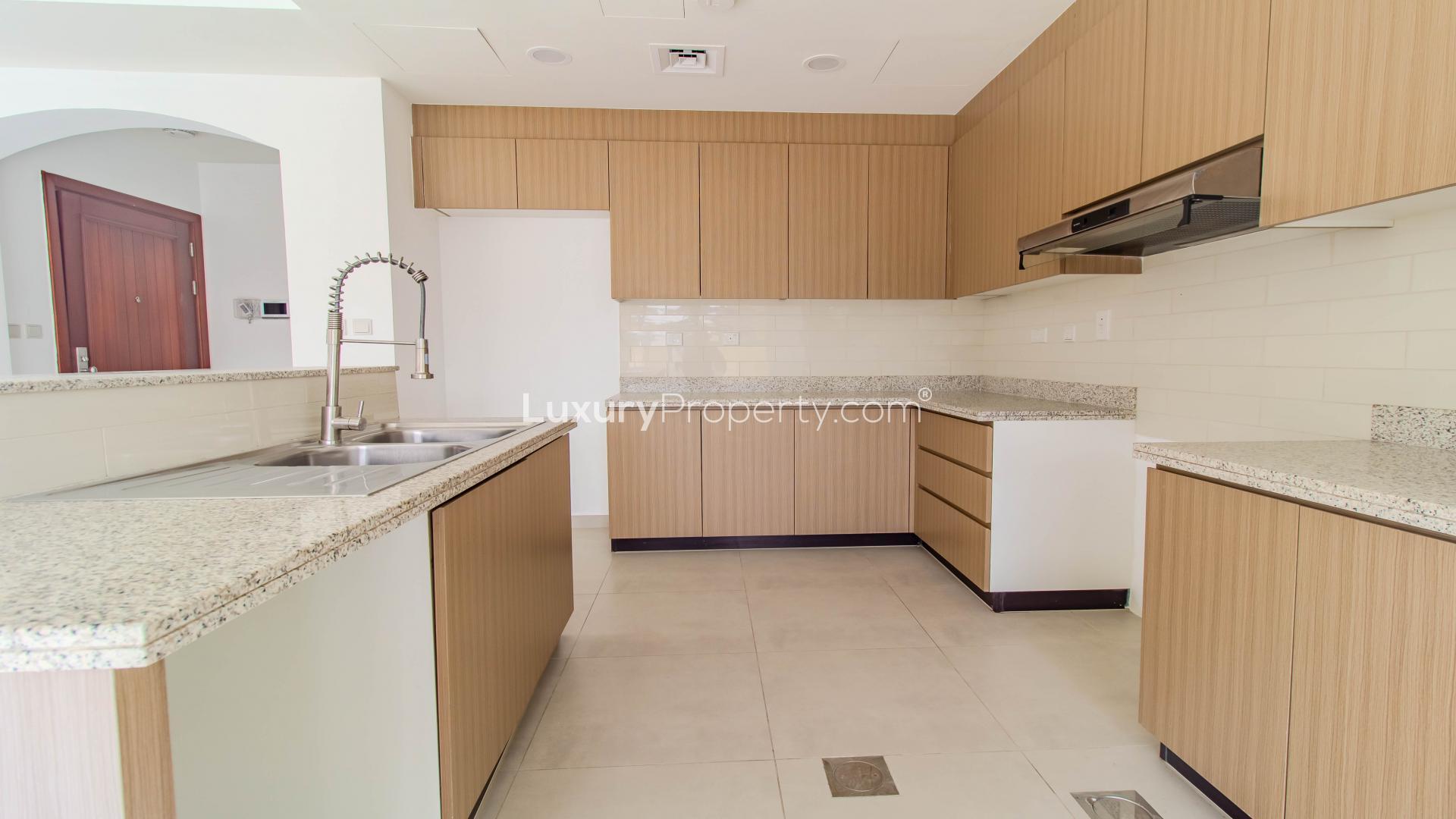 Spacious kitchen and living area in Amaranta villa, Dubai Land, Villanova for rent