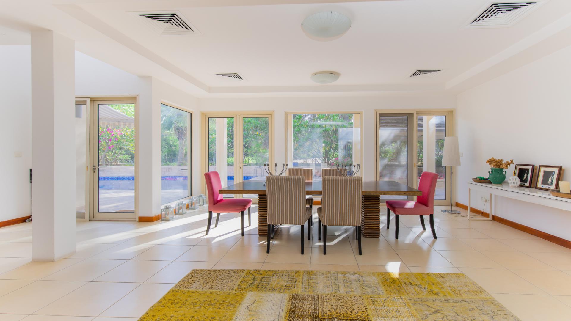 Private pool in Arabian Ranches Saheel villa for rent, surrounded by lush greenery