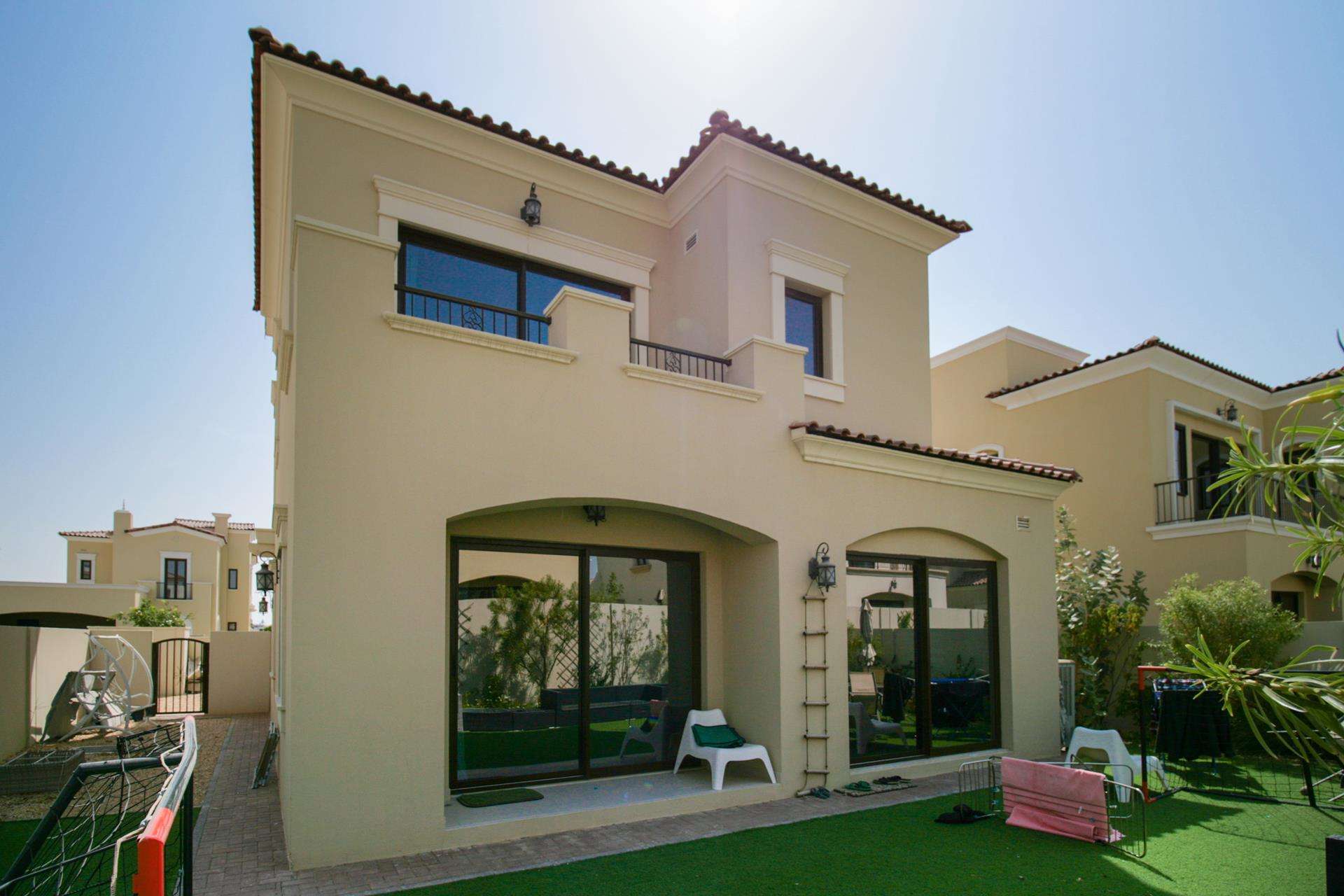 Spacious villa exterior with two-car garage in Samara, Arabian Ranches 2, for rent