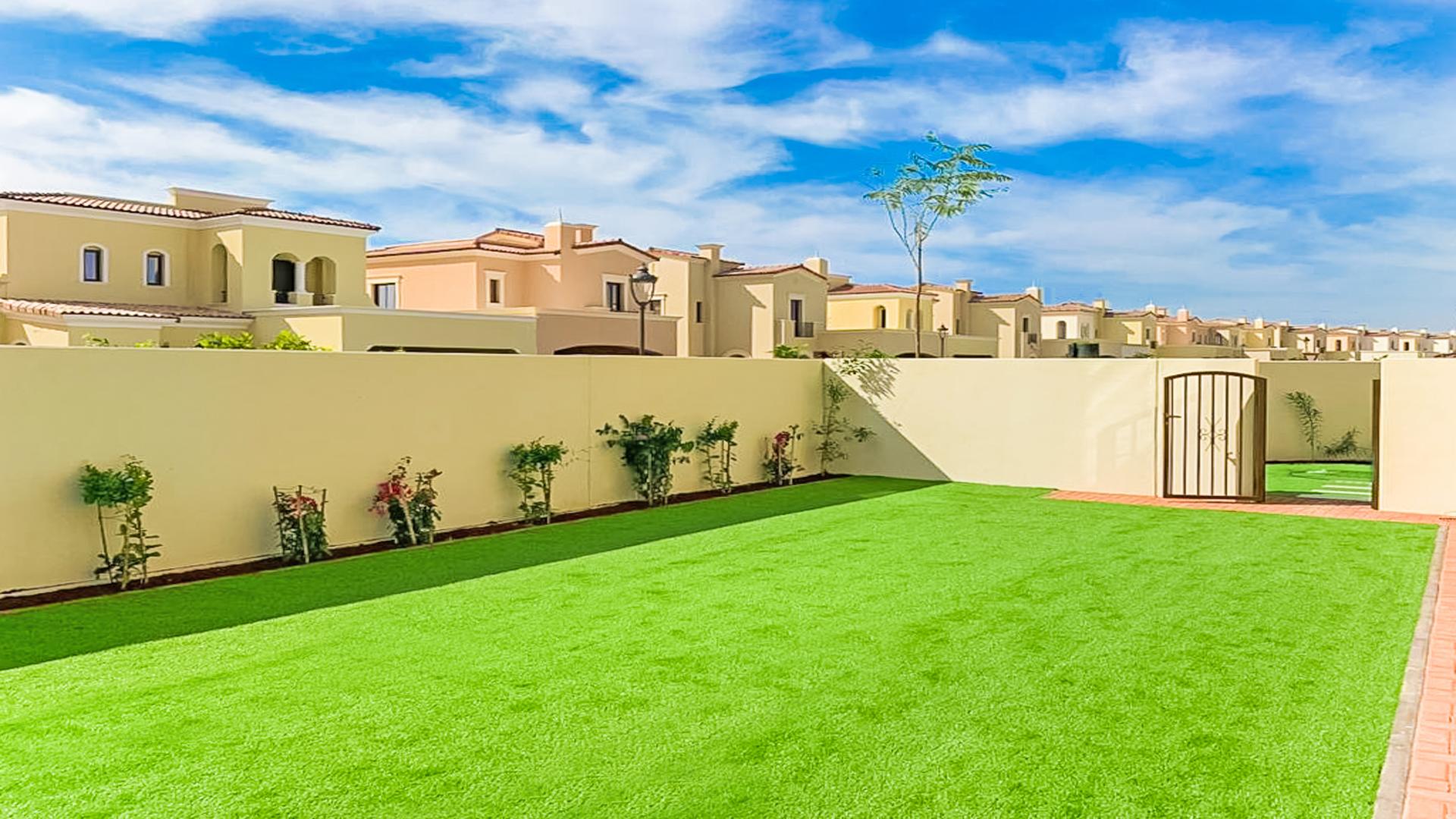 Elegant three-bedroom villa exterior with lush garden in Arabian Ranches 2, Samara