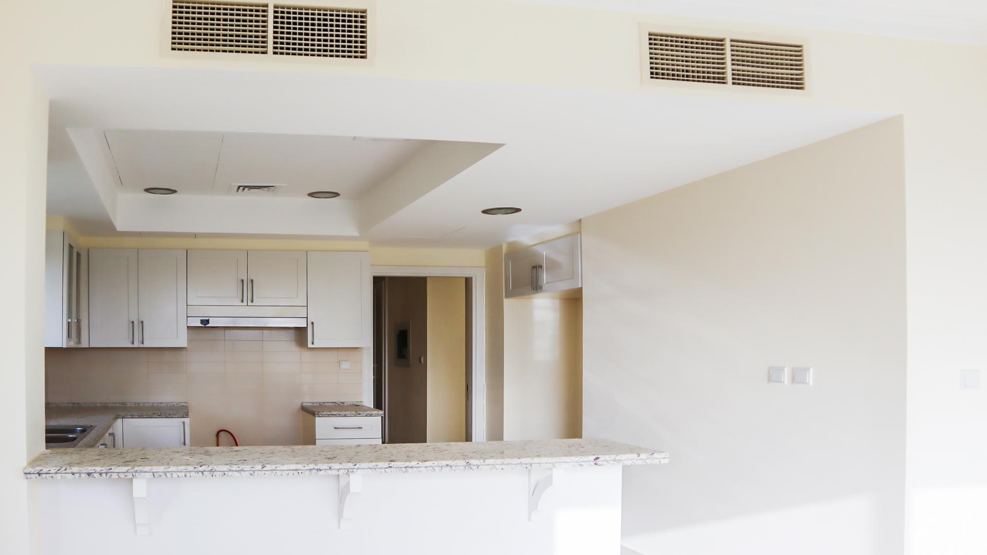 "Bright living area with large windows in Samara villa, Arabian Ranches 2 for rent.",Modern kitchen with granite countertops in Arabian Ranches 2, Samara villa for rent