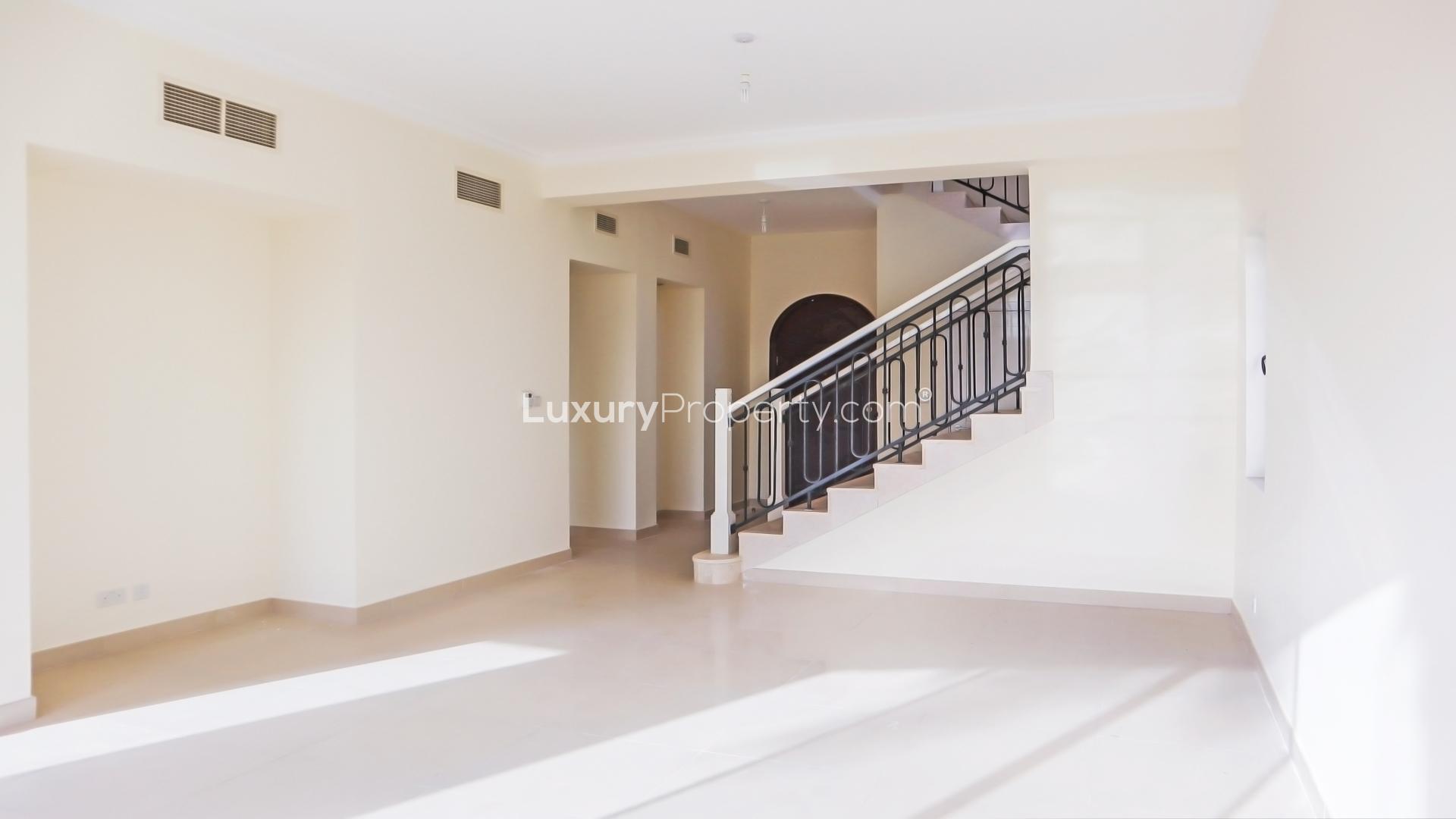 Bright living room with large windows in Samara villa, Arabian Ranches 2