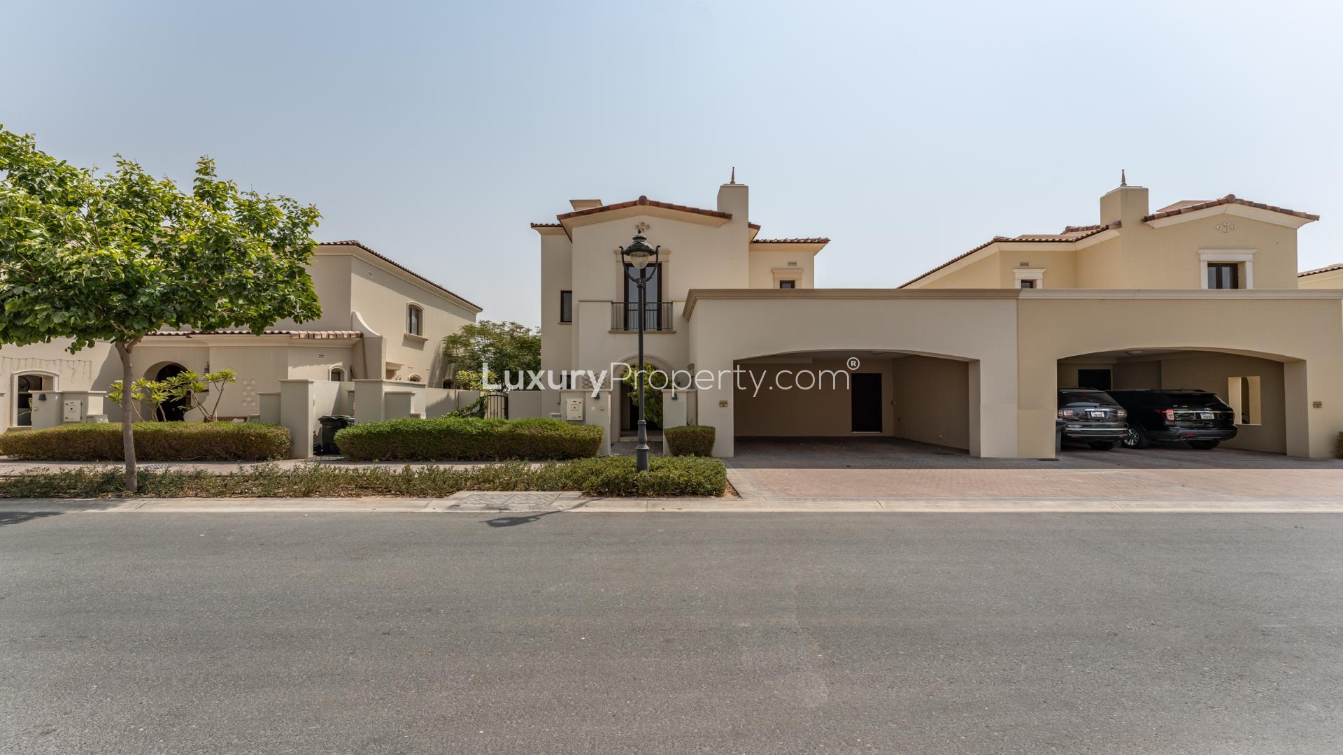 Luxurious 3-bedroom villa exterior in Samara, Arabian Ranches 2, with driveway and garden