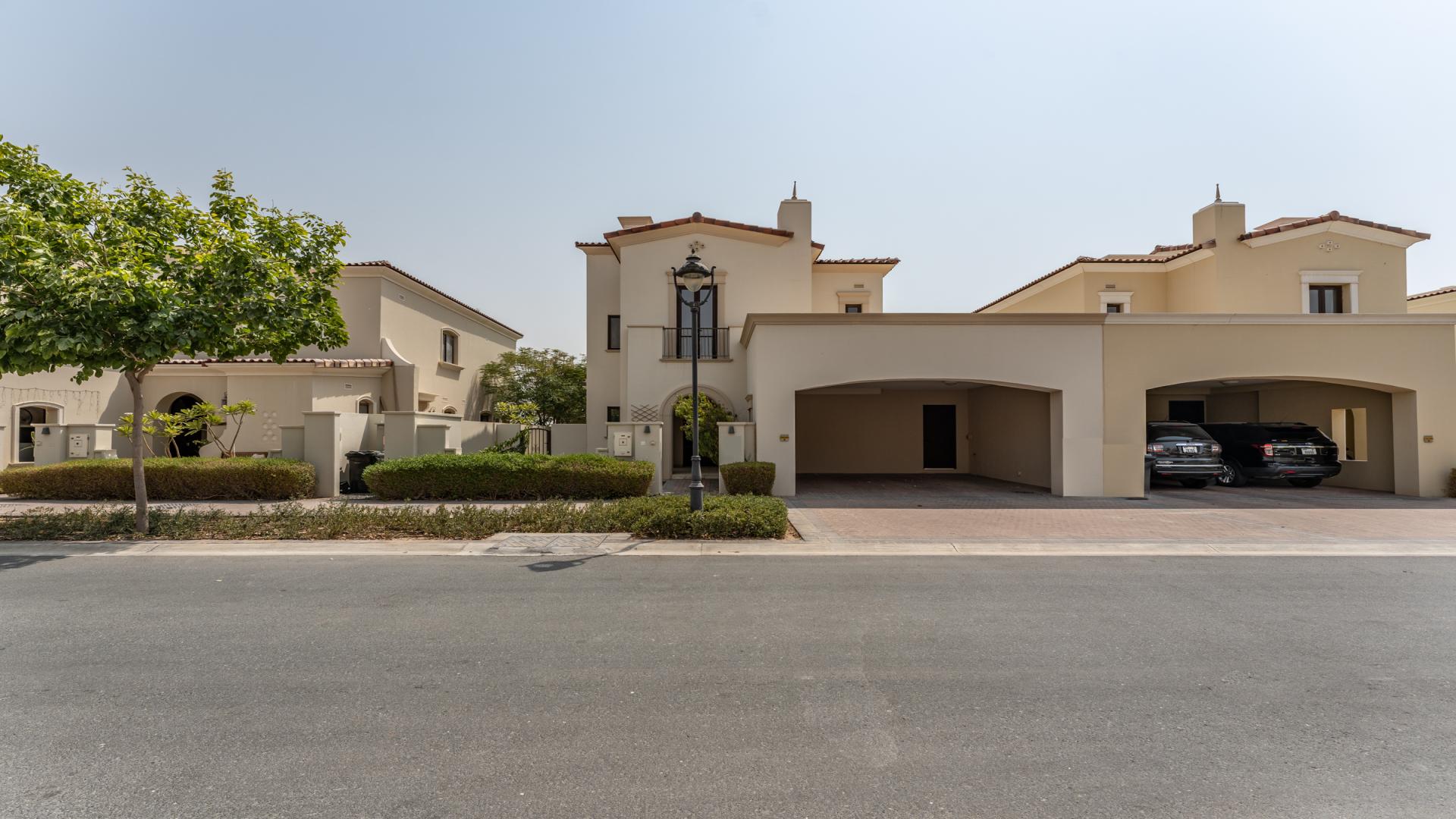 Luxurious 3-bedroom villa exterior in Samara, Arabian Ranches 2, with driveway and garden