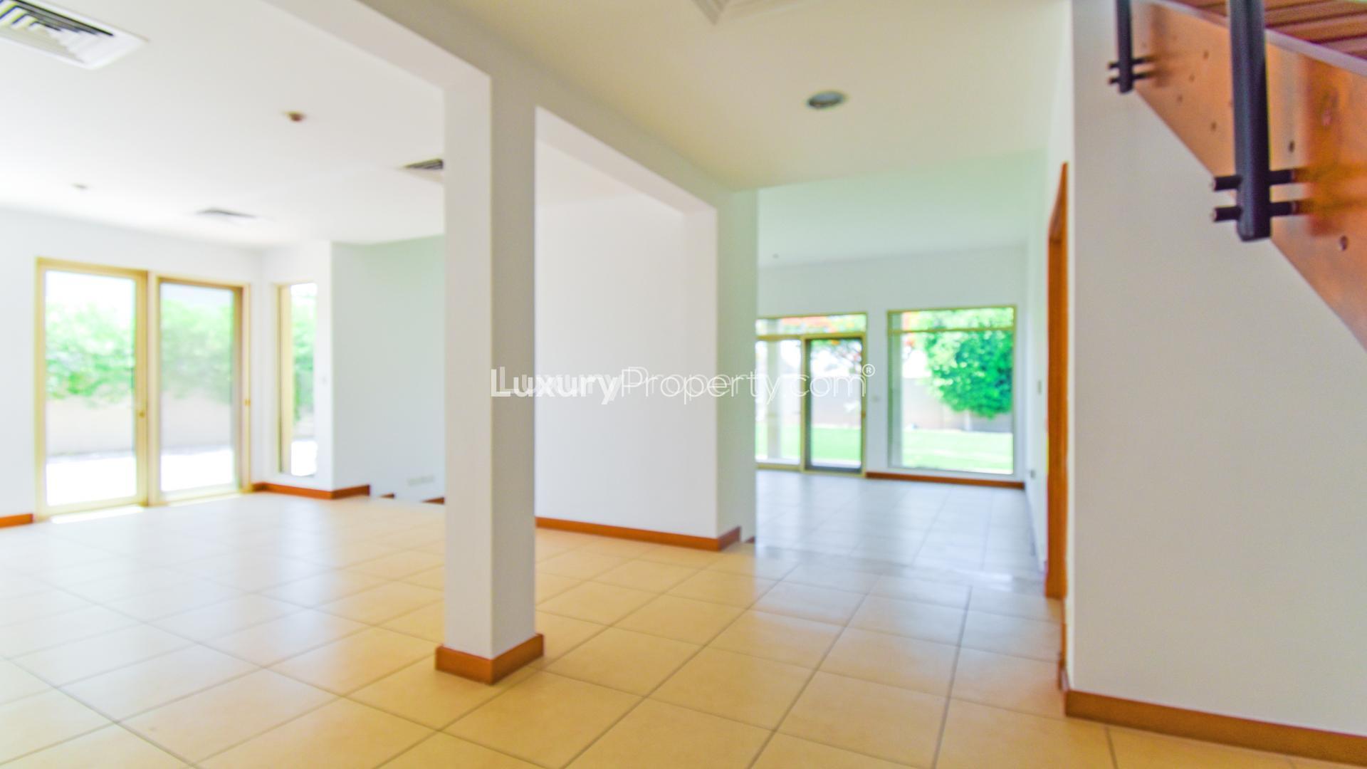 Spacious living room with fireplace in Savannah villa, Arabian Ranches 2, Dubai