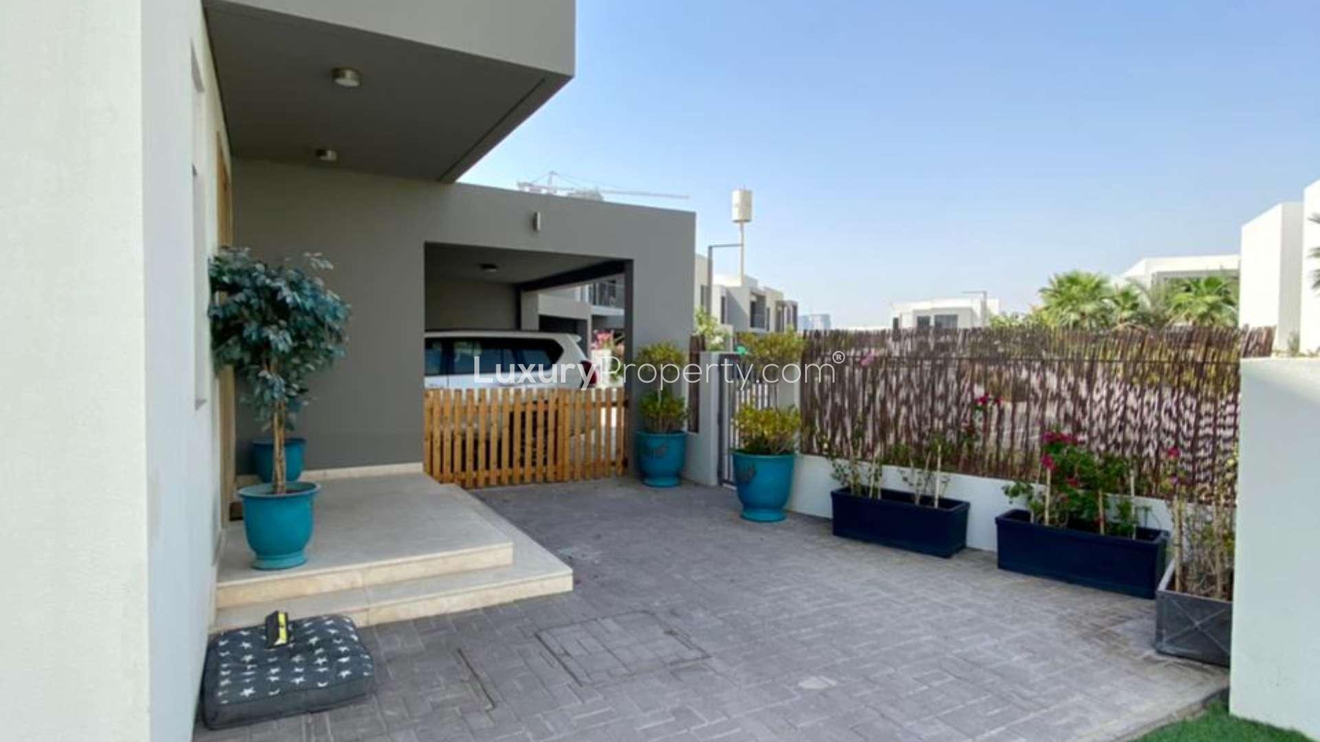 Spacious backyard with trampoline and seating area in Sidra villa, Dubai Hills Estate