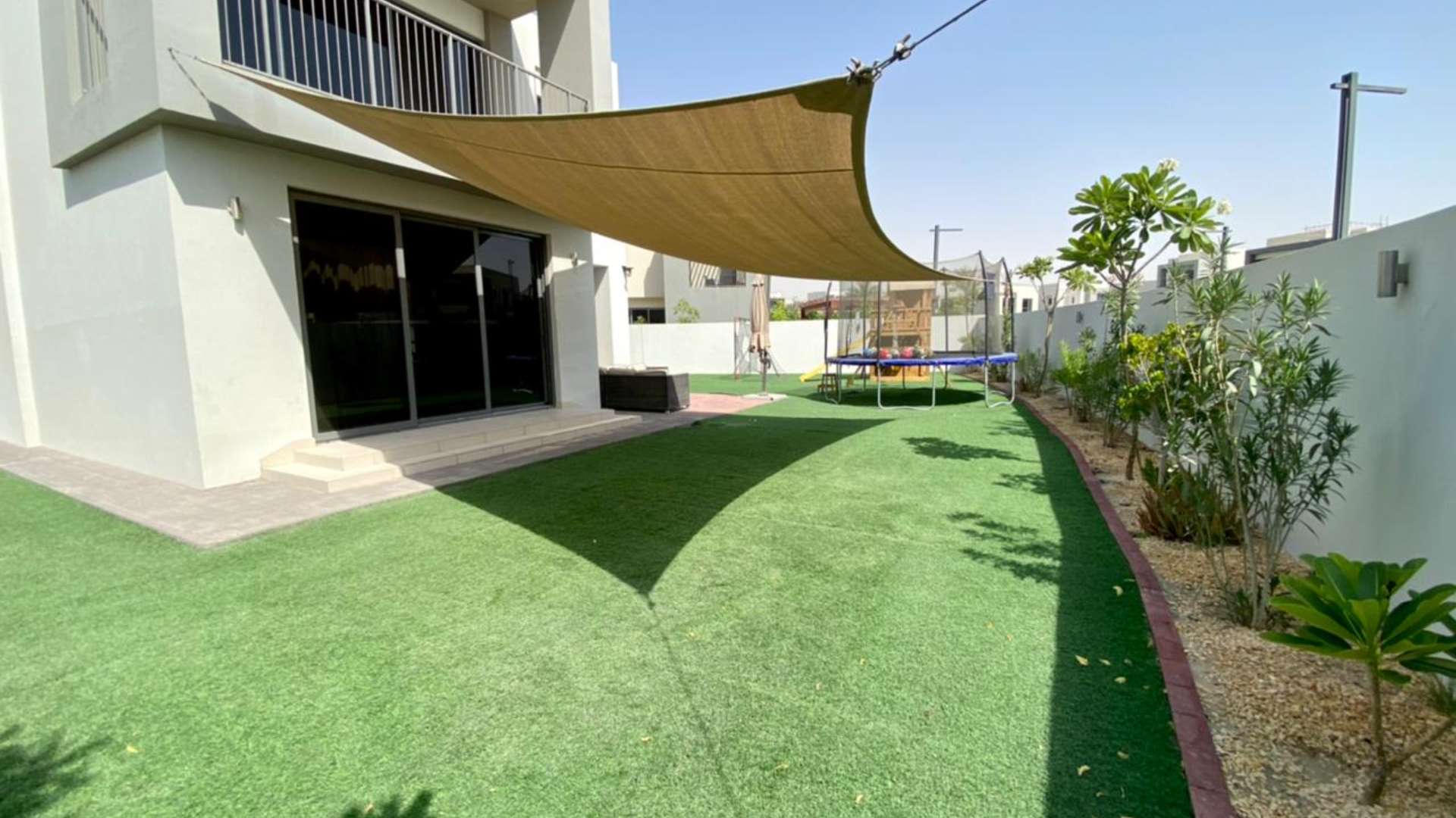 Covered patio and garden area of 3-bedroom villa in Sidra, Dubai Hills Estate