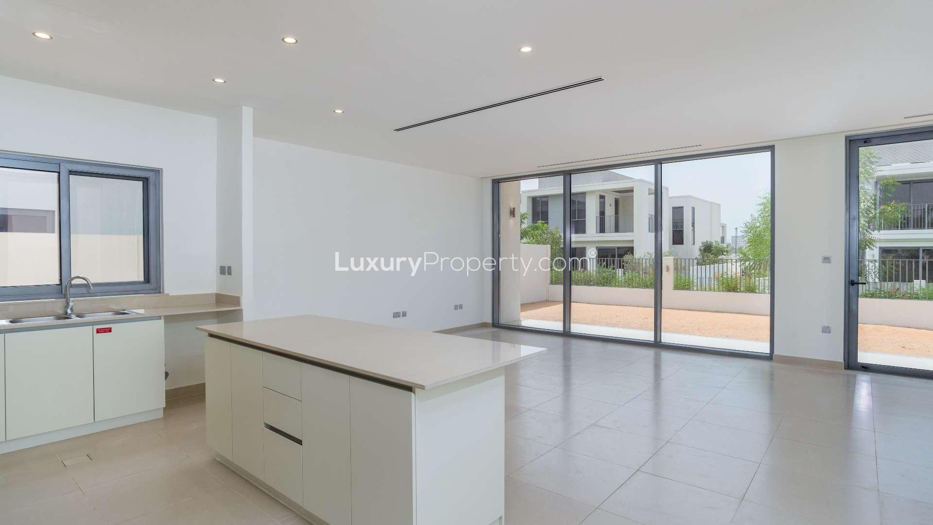 "Modern kitchen and living area in three-bedroom Sidra Villa, Dubai Hills Estate, for rent.",Spacious open-plan kitchen and living area in Sidra Villas, Dubai Hills Estate