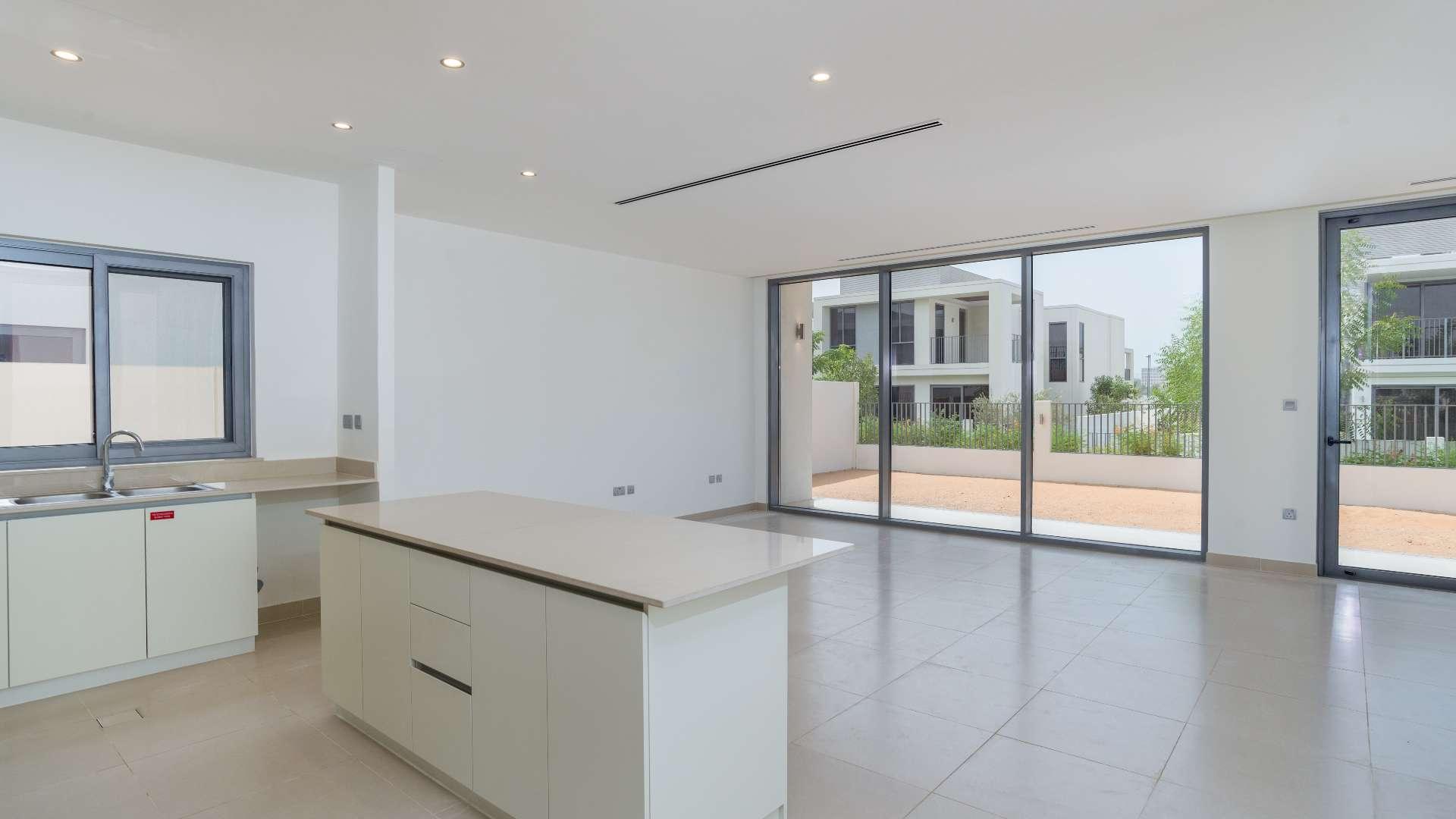 "Modern kitchen and living area in three-bedroom Sidra Villa, Dubai Hills Estate, for rent.",Spacious open-plan kitchen and living area in Sidra Villas, Dubai Hills Estate
