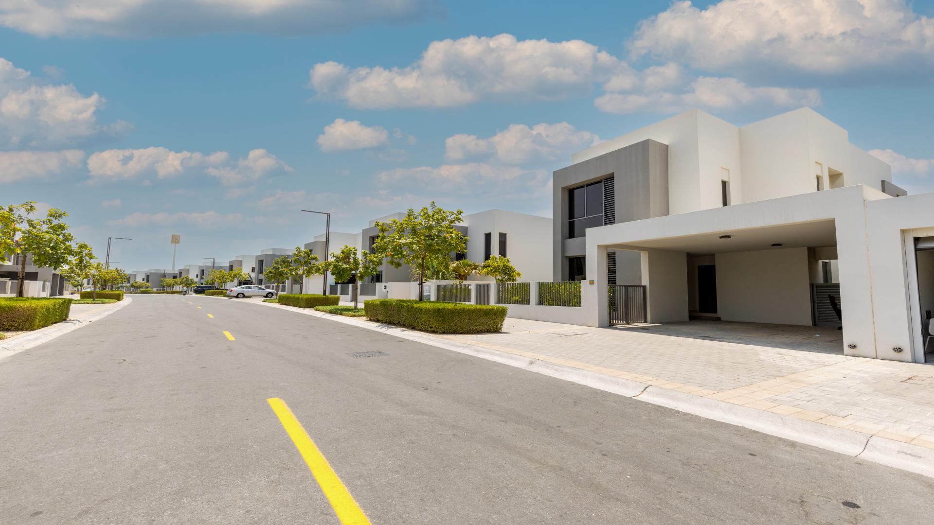 Single row villa exterior in Sidra Villas, Dubai Hills Estate, with landscaped surroundings