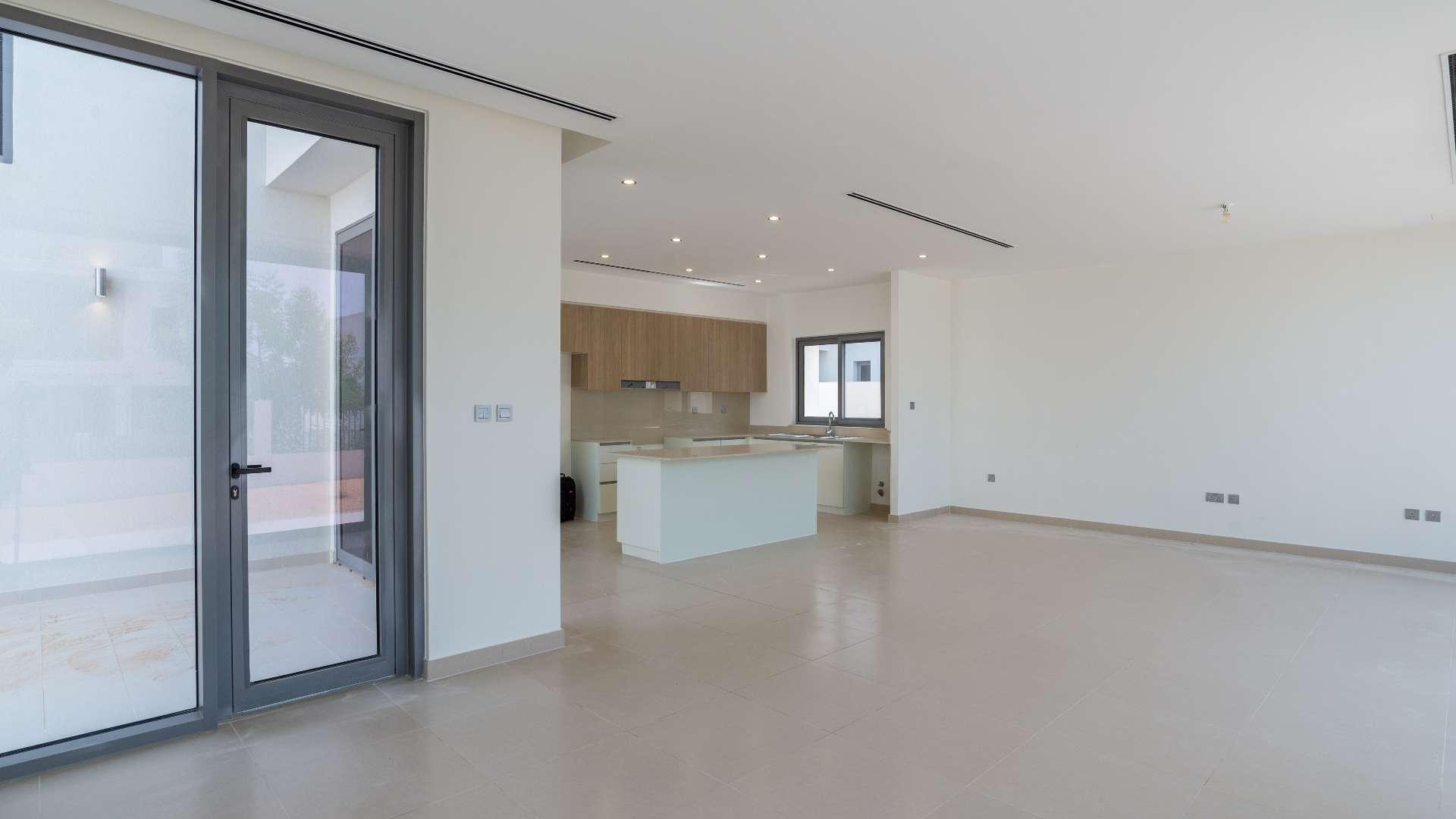 Modern kitchen and living area in Sidra Villas, Dubai Hills Estate, vacant villa for rent