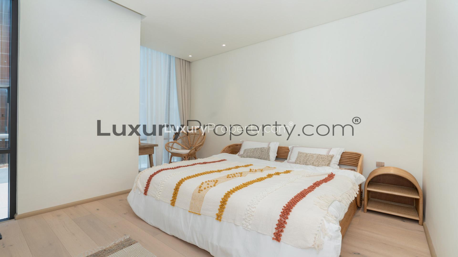 Modern kitchen and dining area in 3-bedroom villa, The Autograph X, Jumeirah Village Circle