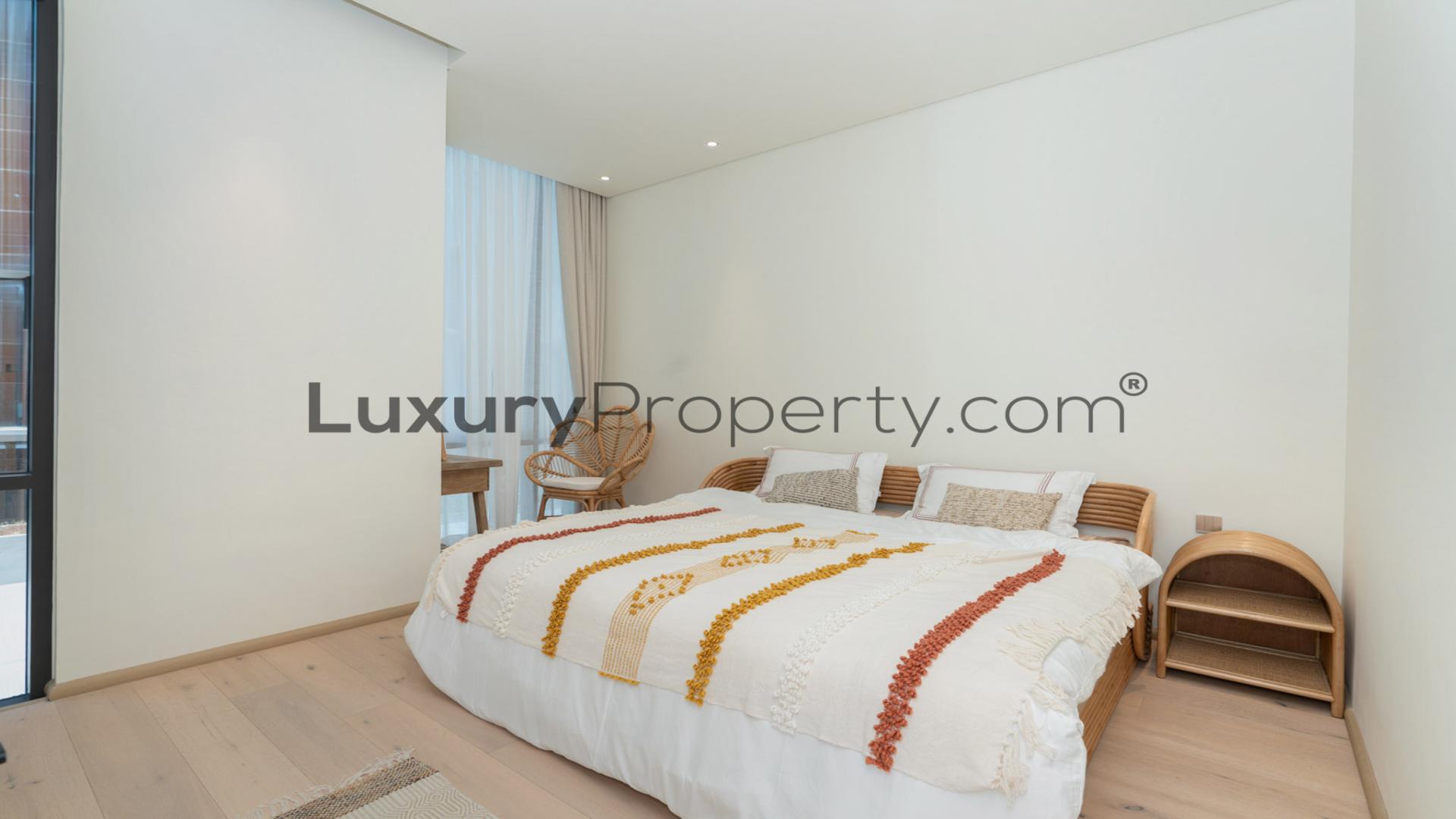 Modern kitchen and dining area in 3-bedroom villa, The Autograph X, Jumeirah Village Circle