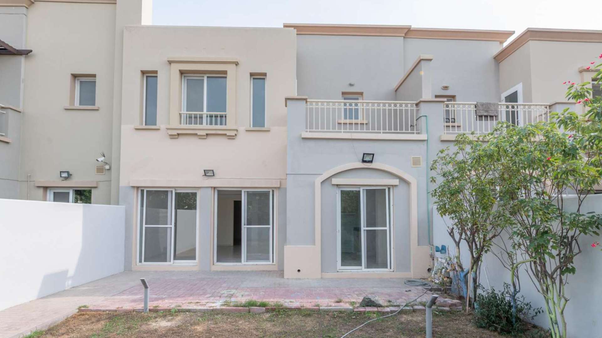 Charming 3-bedroom villa exterior with serene garden in Springs 15, Emirates Living